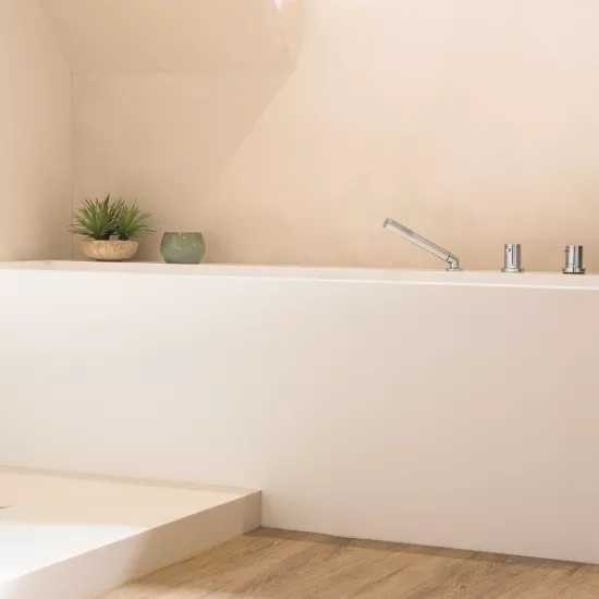 A refined bathroom in HIMACS exuding harmony and serenity