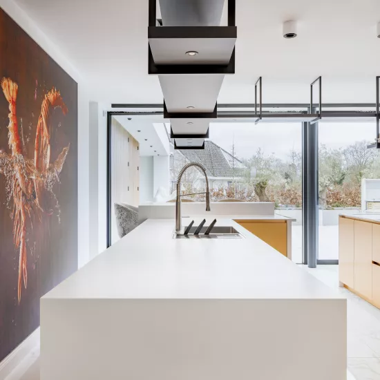 Contrasting finishes: HIMACS and copper shine brightly in this kitchen