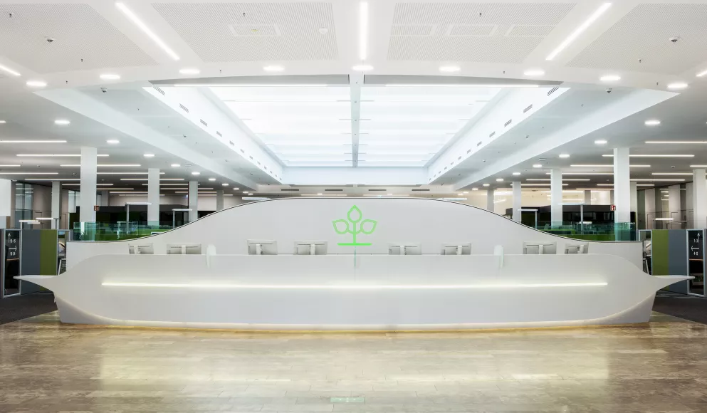 A captivating HIMACS reception desk for AOK offices