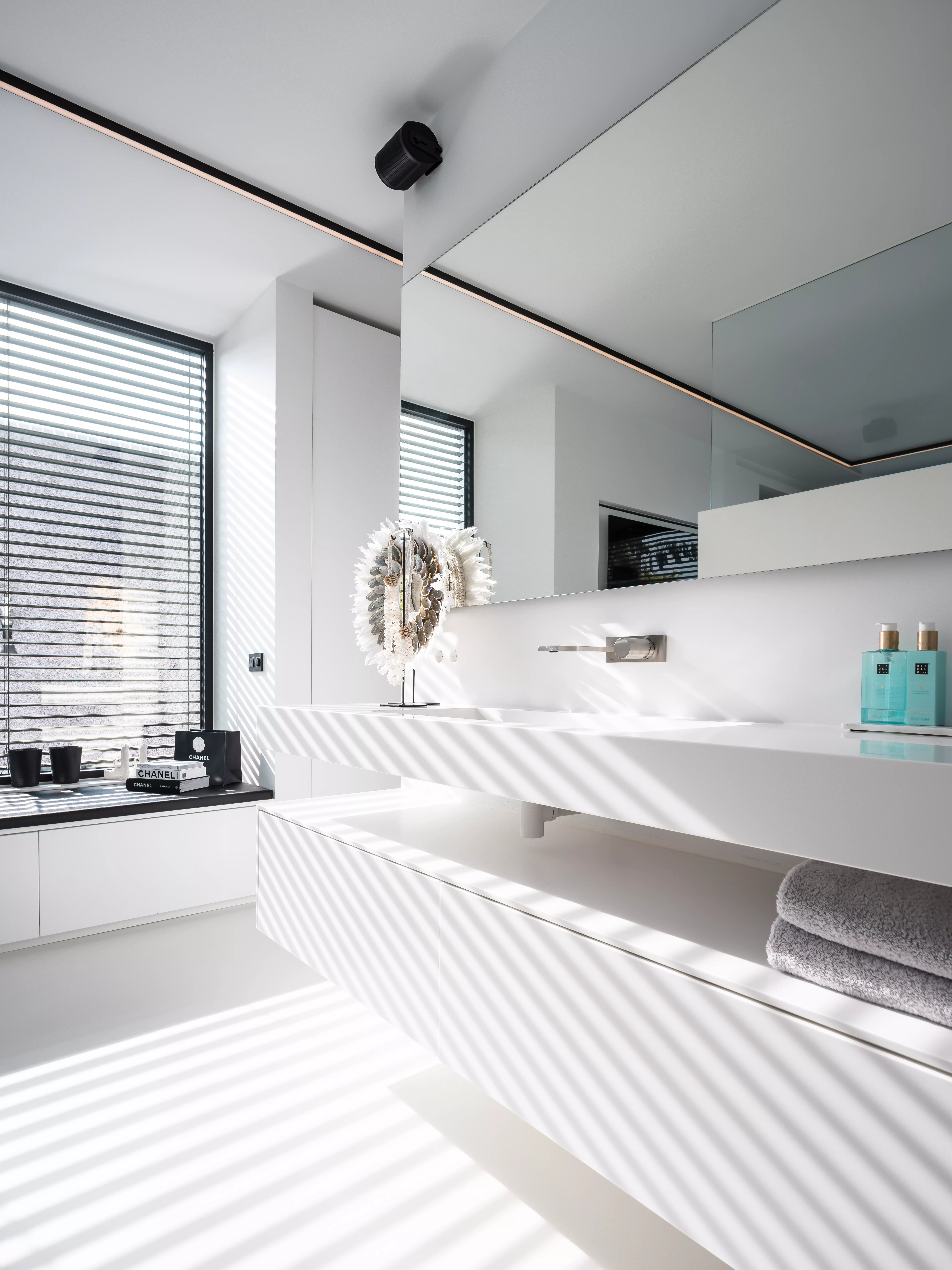 Custom-made HIMACS elements complement this light-filled Dutch Villa