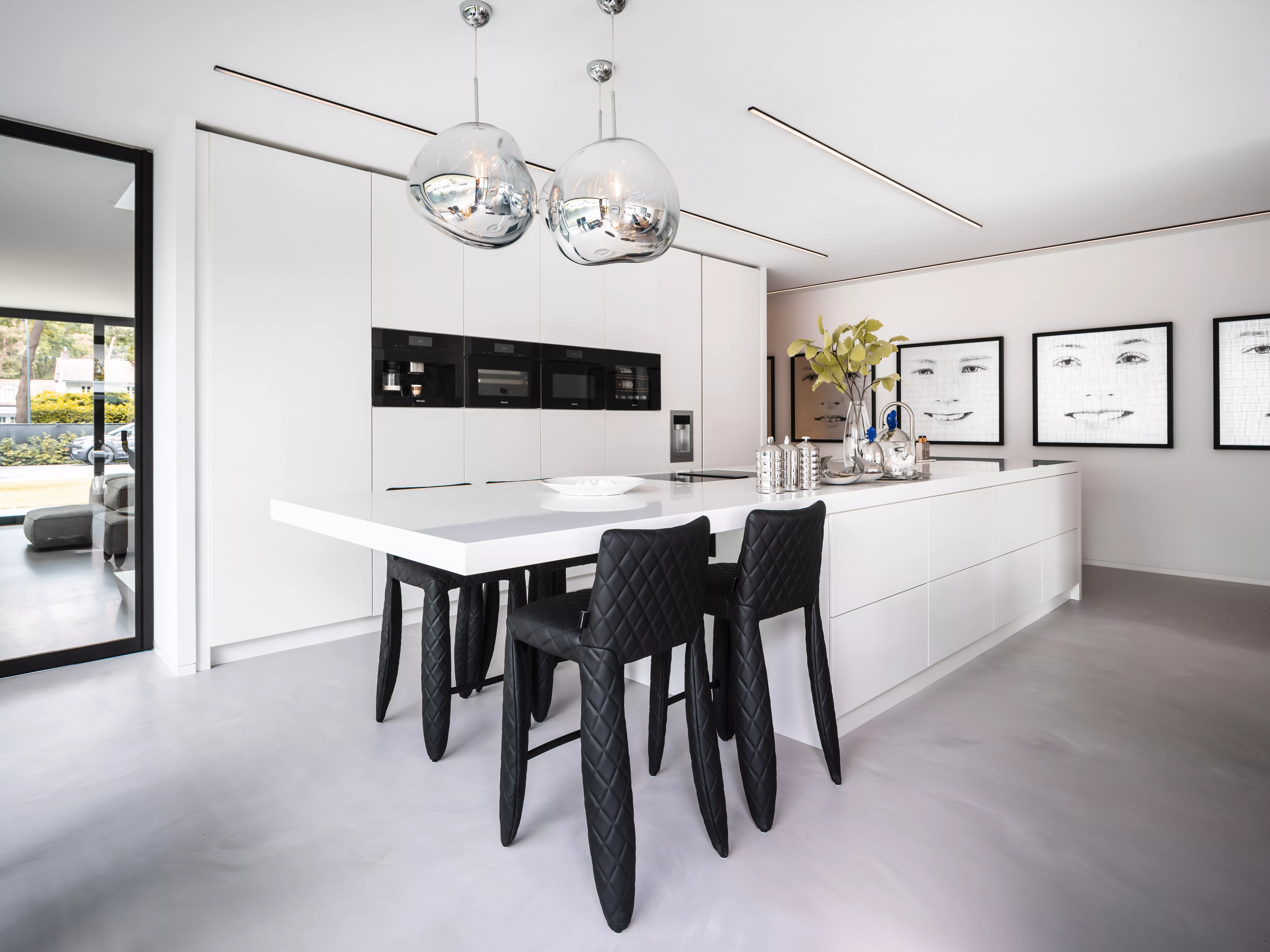 Custom-made HIMACS elements complement this light-filled Dutch Villa