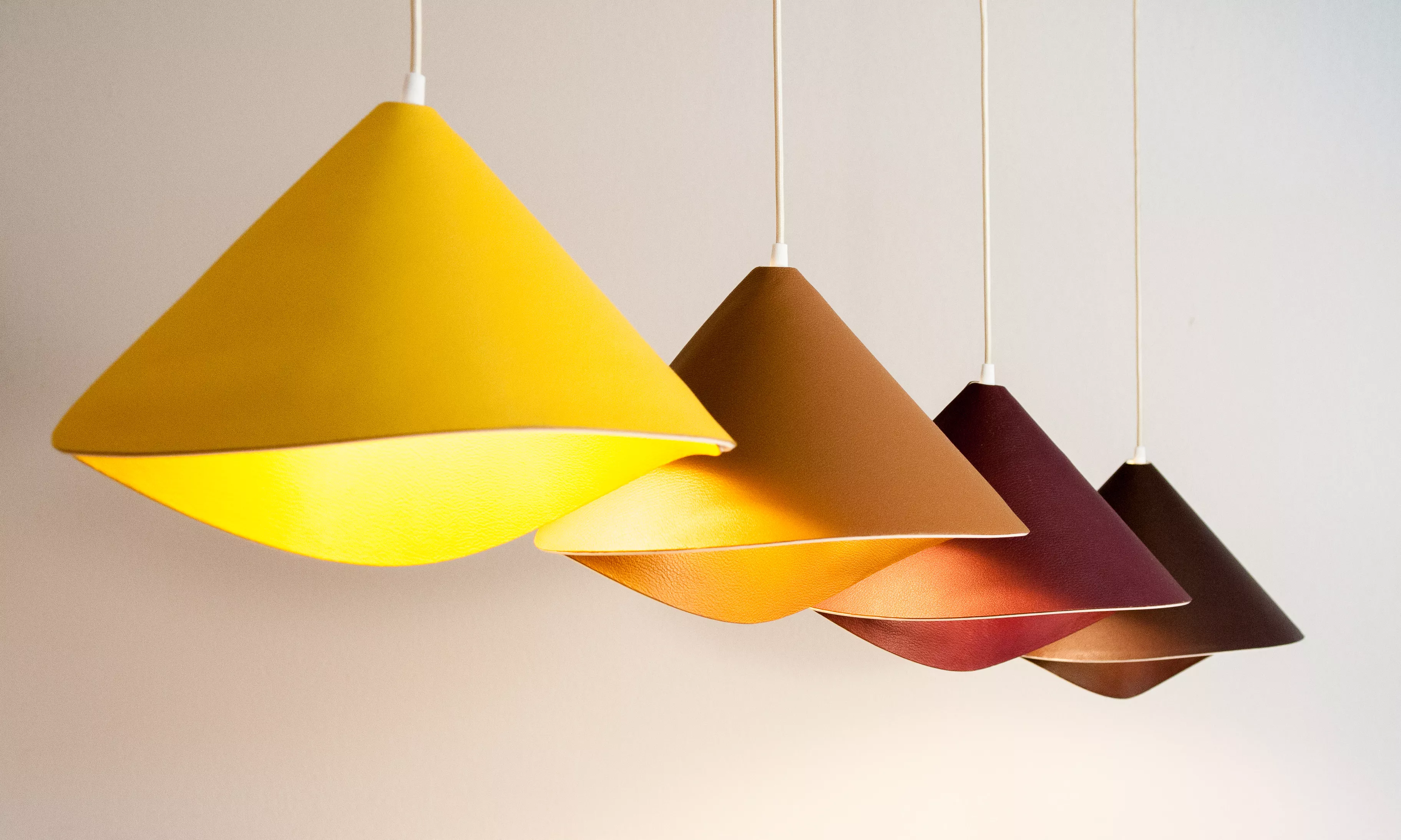 The return of the iconic Tulip lamp, with an elegant new pendant version