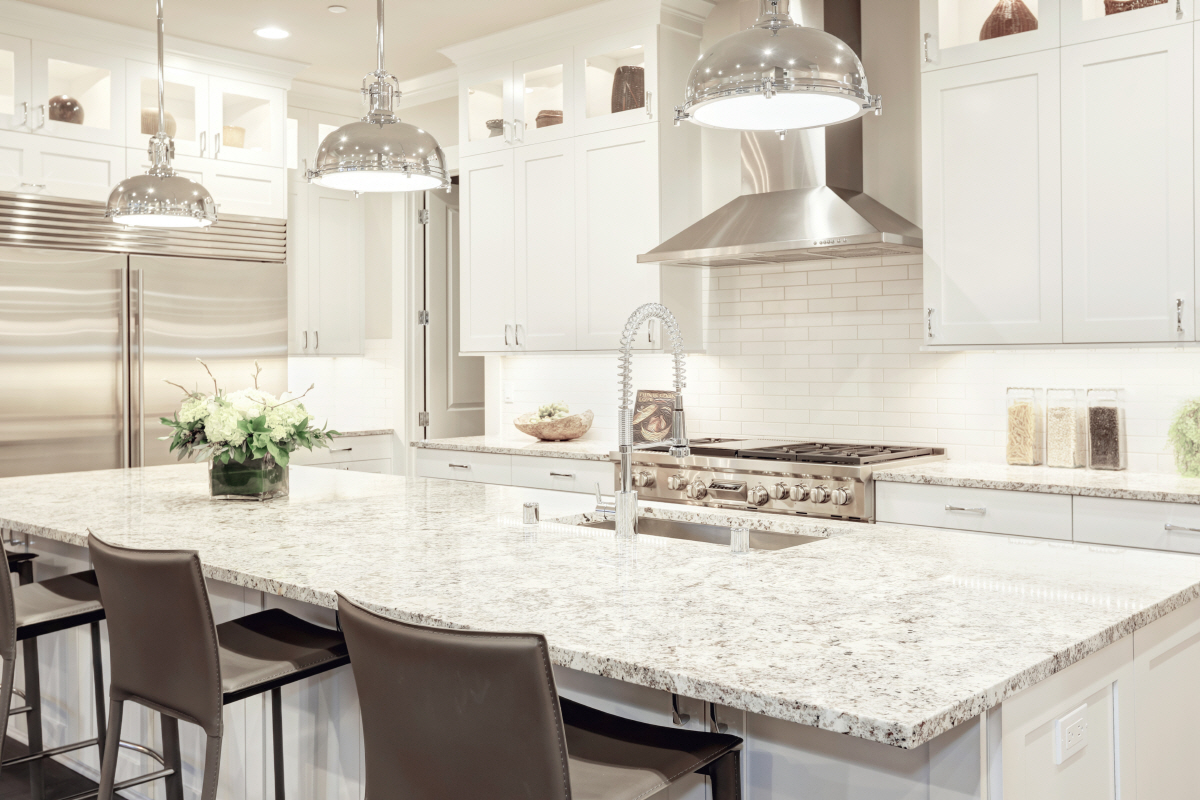 thunder white granite with light grey cabinet kitchen