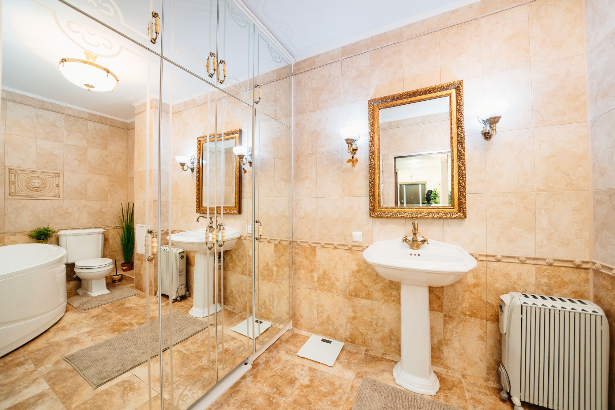 Large mirrors double the bathroom's size by reflecting light and space.