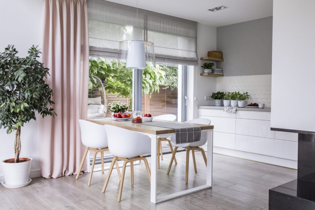 Natural light in kitchen boosts mood, expands space; try sheer curtains for maximum brightness.