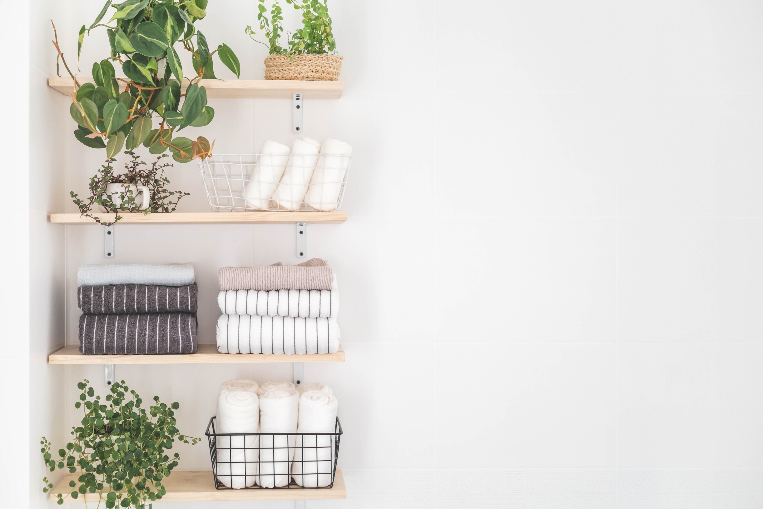 Floating corner shelves are an effective way to display ornaments.