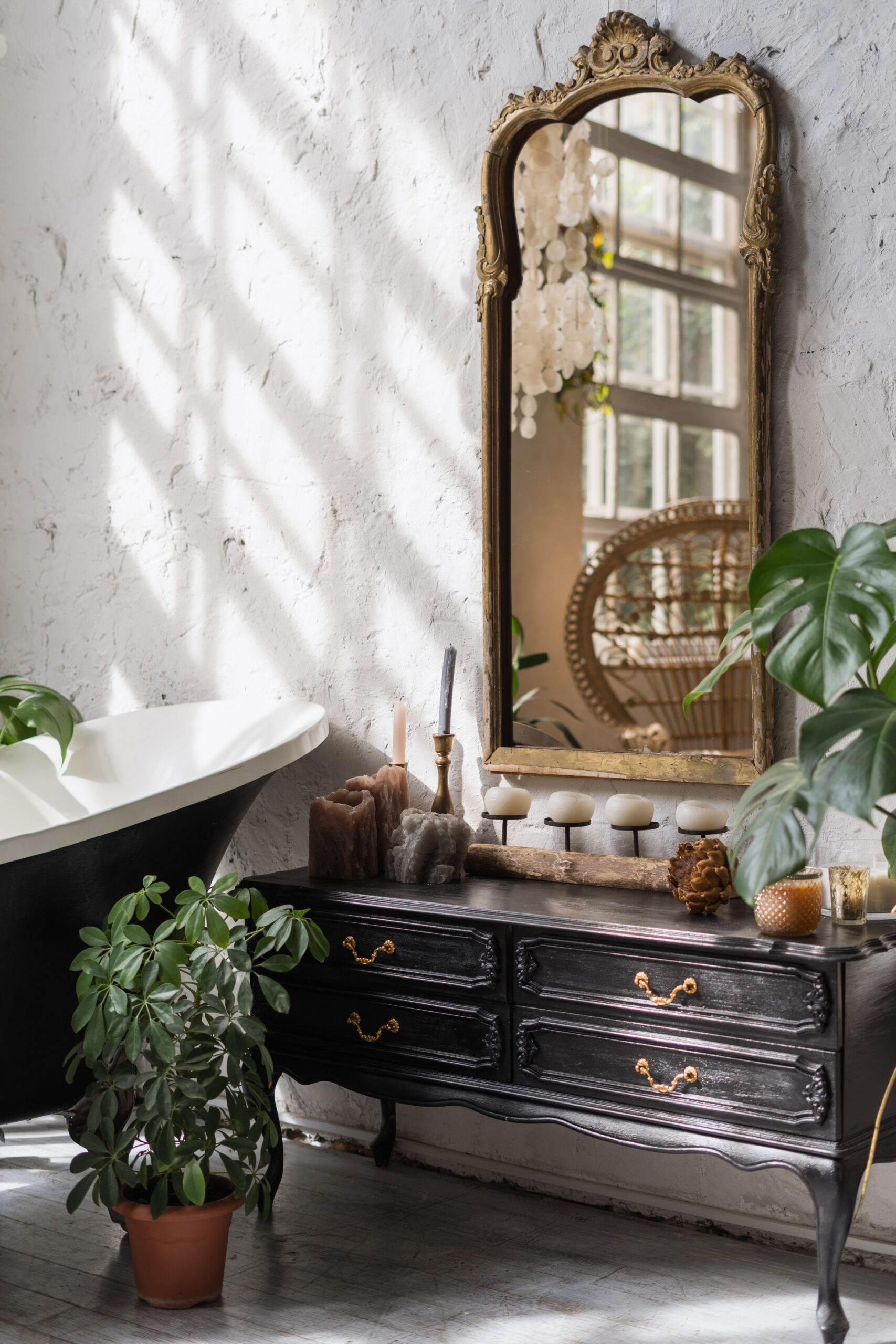 Decorate the focal points of your bathroom—such as the sink, vanity, and mirror—in a vintage style.