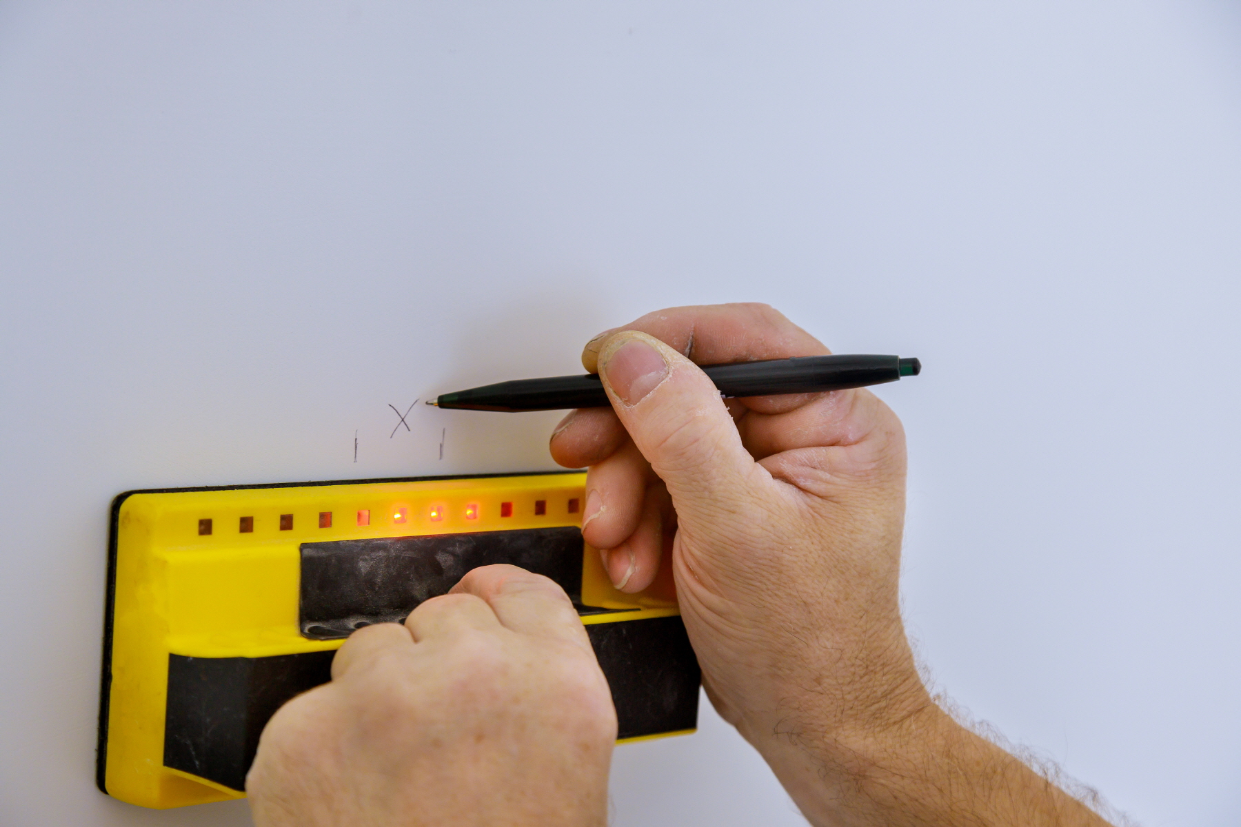 Before starting your bathroom vanity replacement, use a stud finder to locate the studs on the wall where you will install the new vanity.