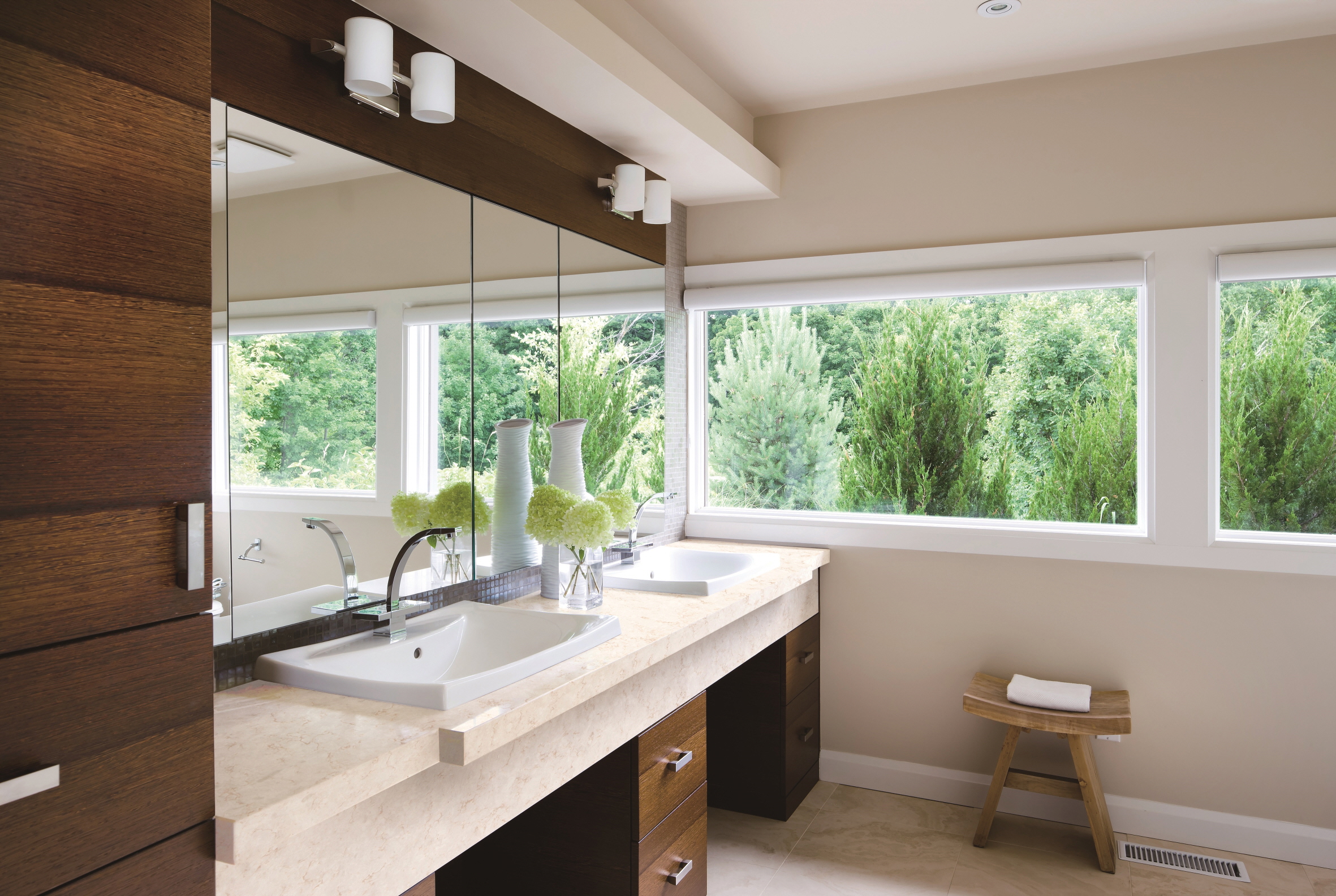 Use textured materials like wood to create a dynamic atmosphere in the powder room.