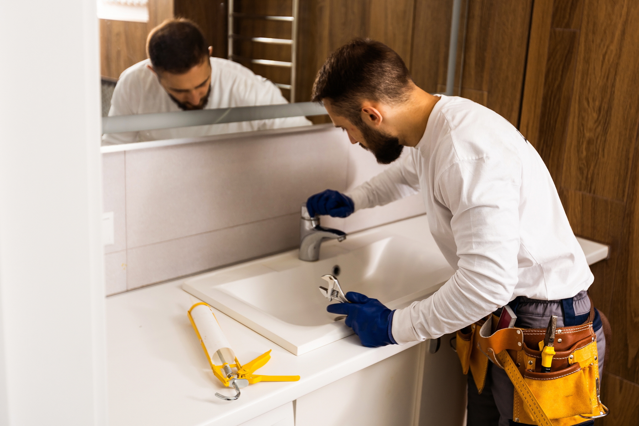 The final step in setting up bathroom vanities is to install the new faucet onto the vanity top