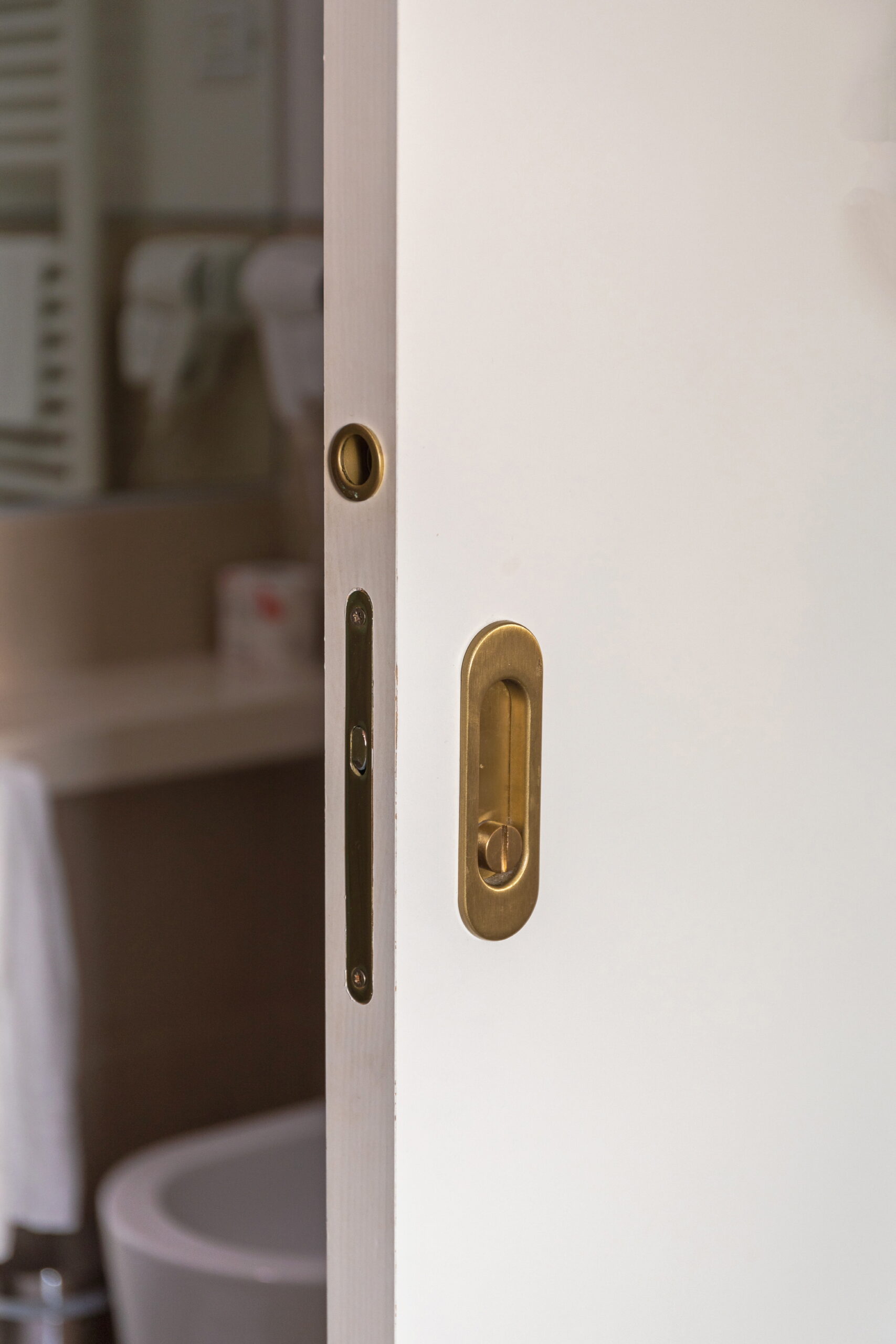 Pocket doors allow guests to slide the door open, reducing the likelihood of tripping over them.