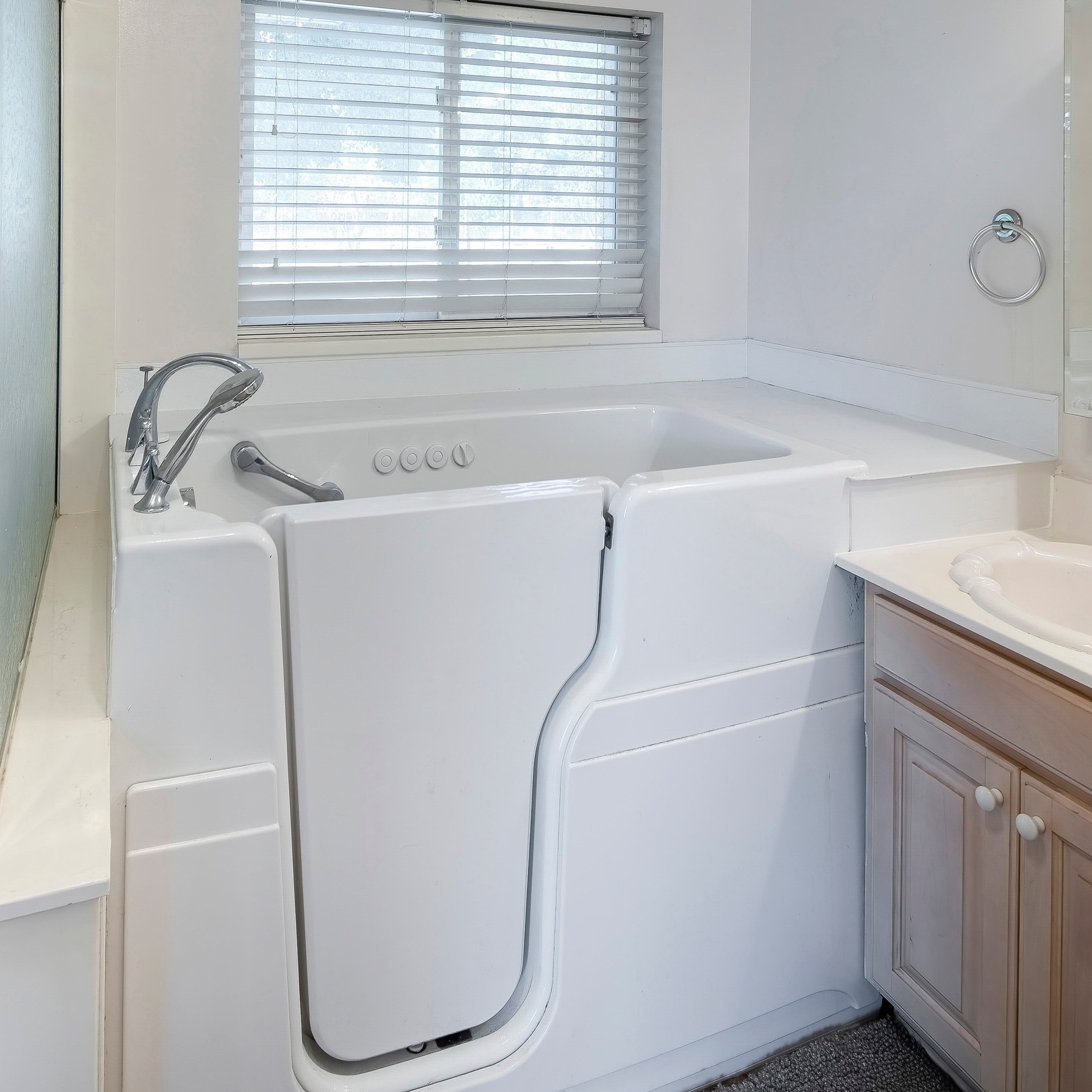 Replacing a bathtub with a walk-in shower has become a popular trend for home renovations.