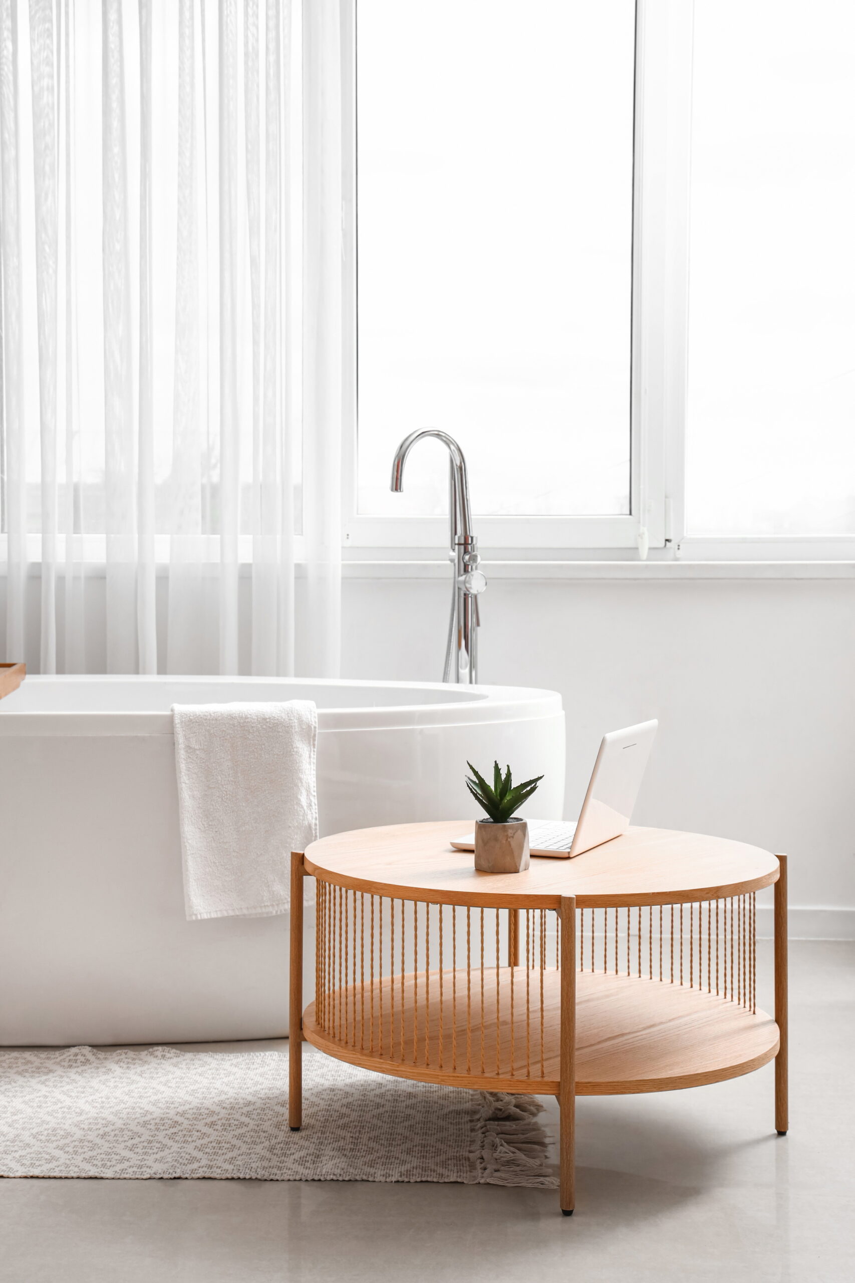 Updating your window treatments through new curtains or blinds will enhance colors and textures in your bathroom space.