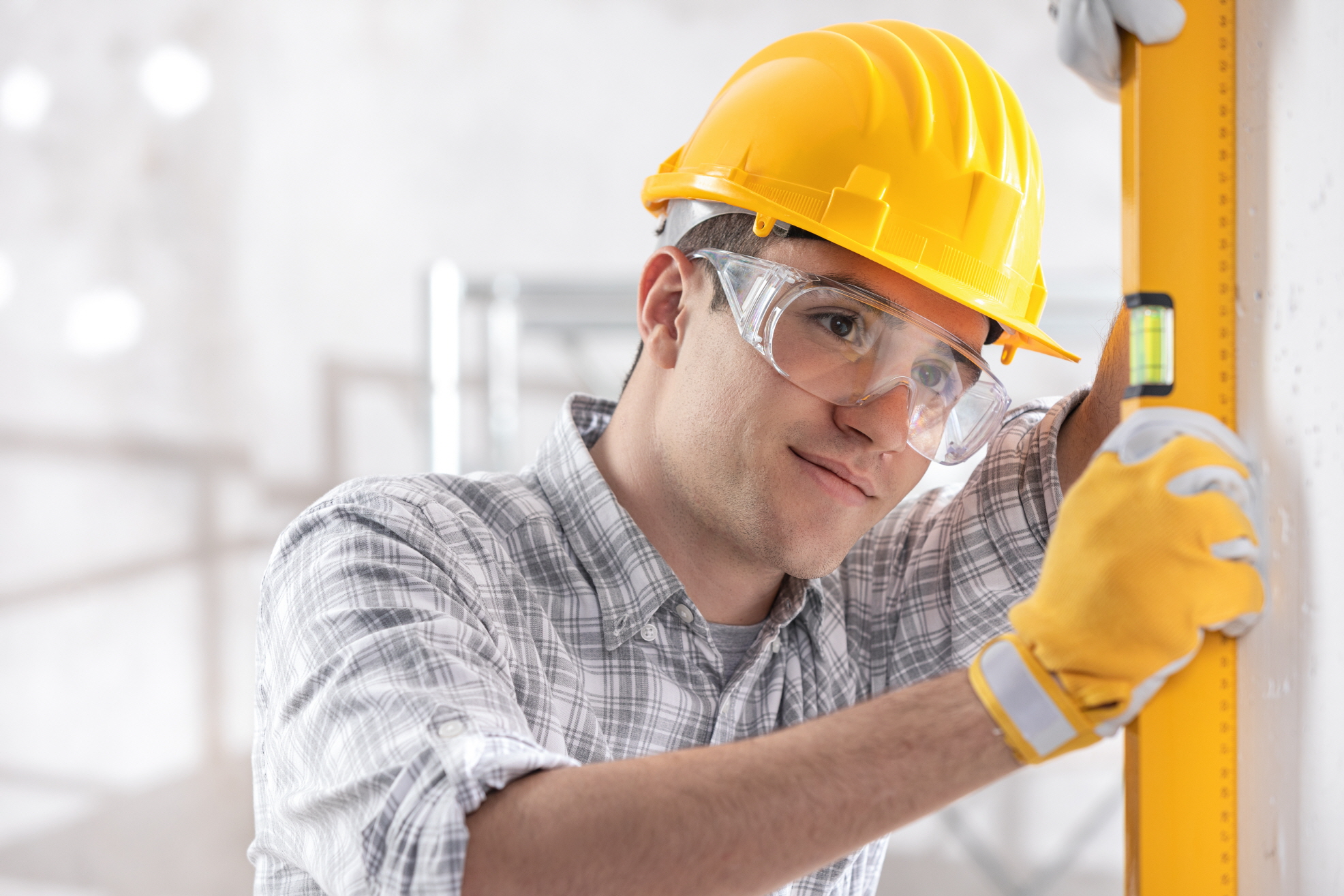 Gathering safety gear like gloves and safety glasses is a crucial first step when replacing a sink.