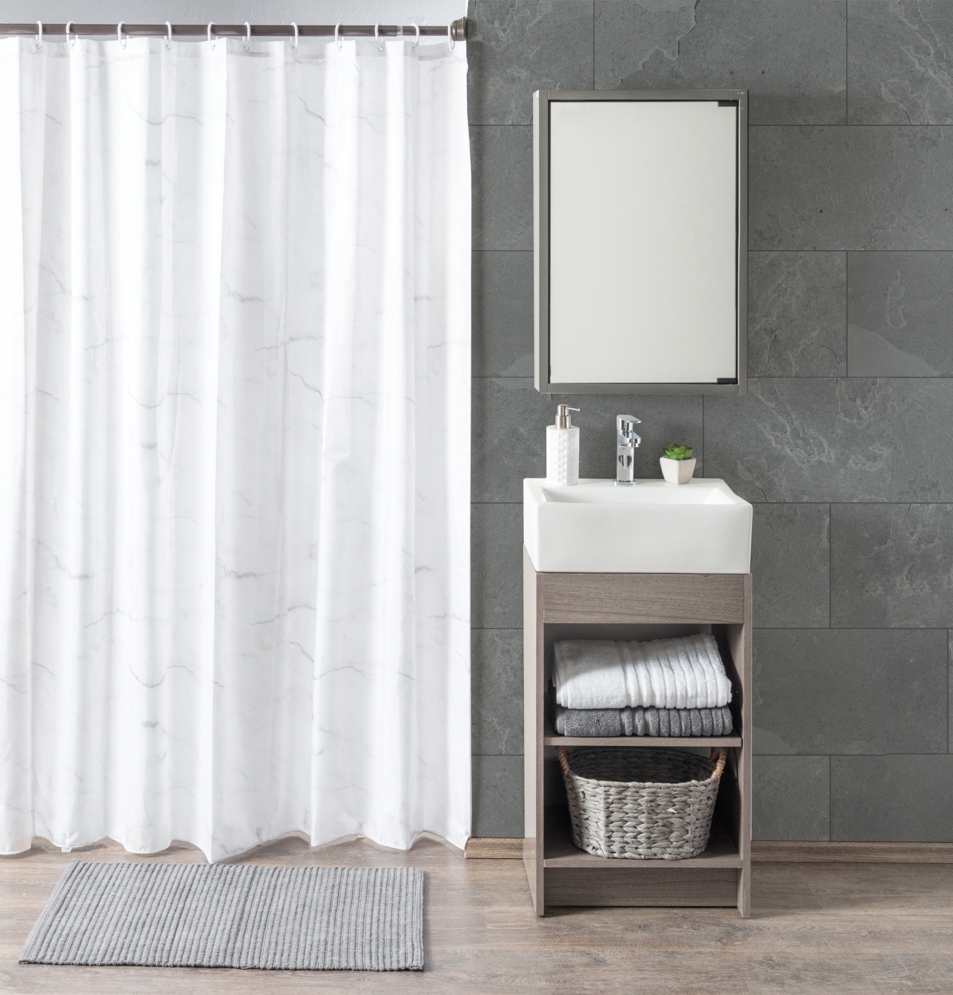 Extend the shower curtain to the ceiling to create a visually spacious and luxurious feel in the bathroom.