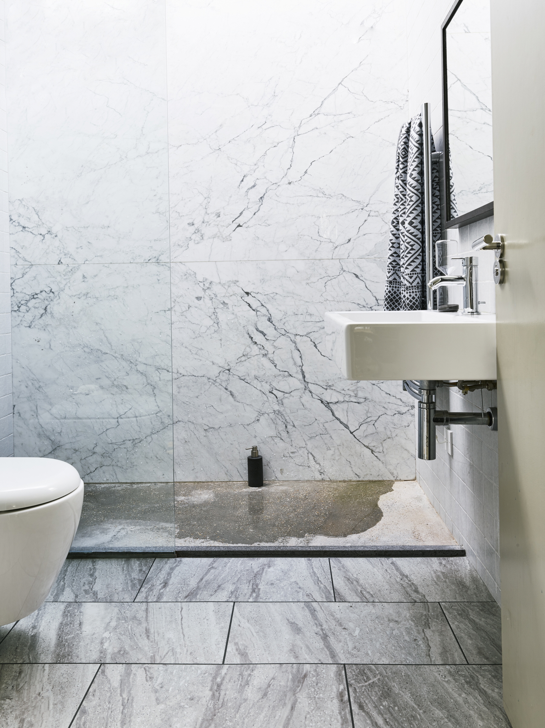 Patterned flooring can transform your bathroom into a dynamic and unique space.