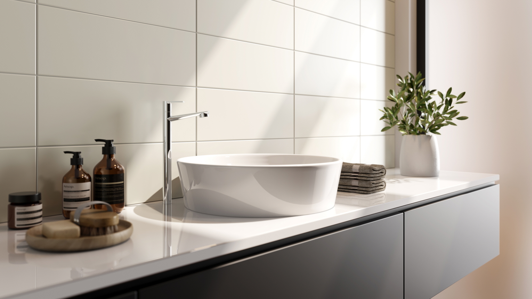 Add a touch of sophistication to your bathroom with a modern, sleek sink design.