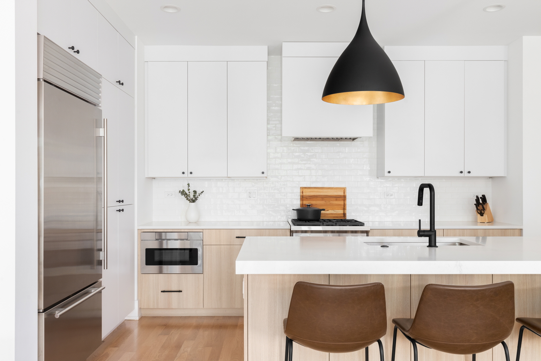 Adding kitchen islands to your kitchen can significantly enhance the space's functionality and utility.