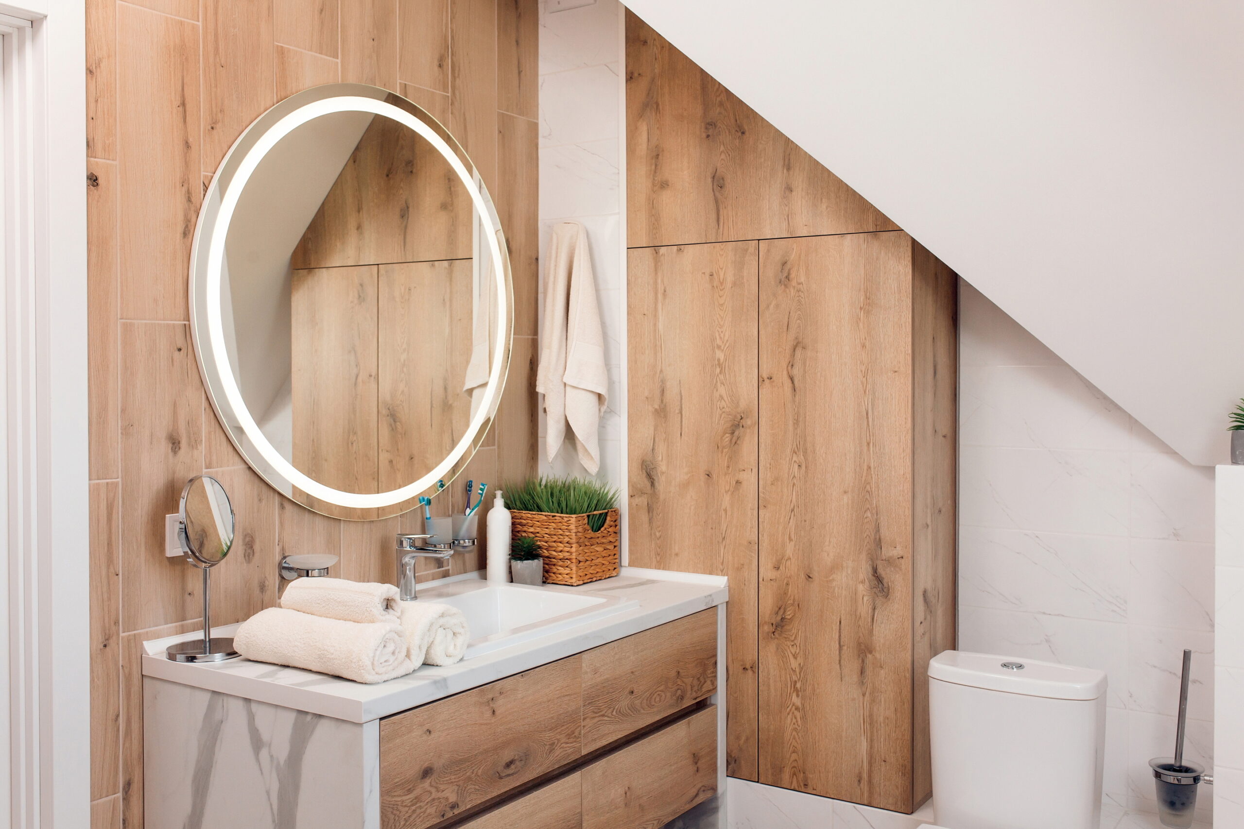 Incorporate wood elements to infuse your bathroom with warmth.