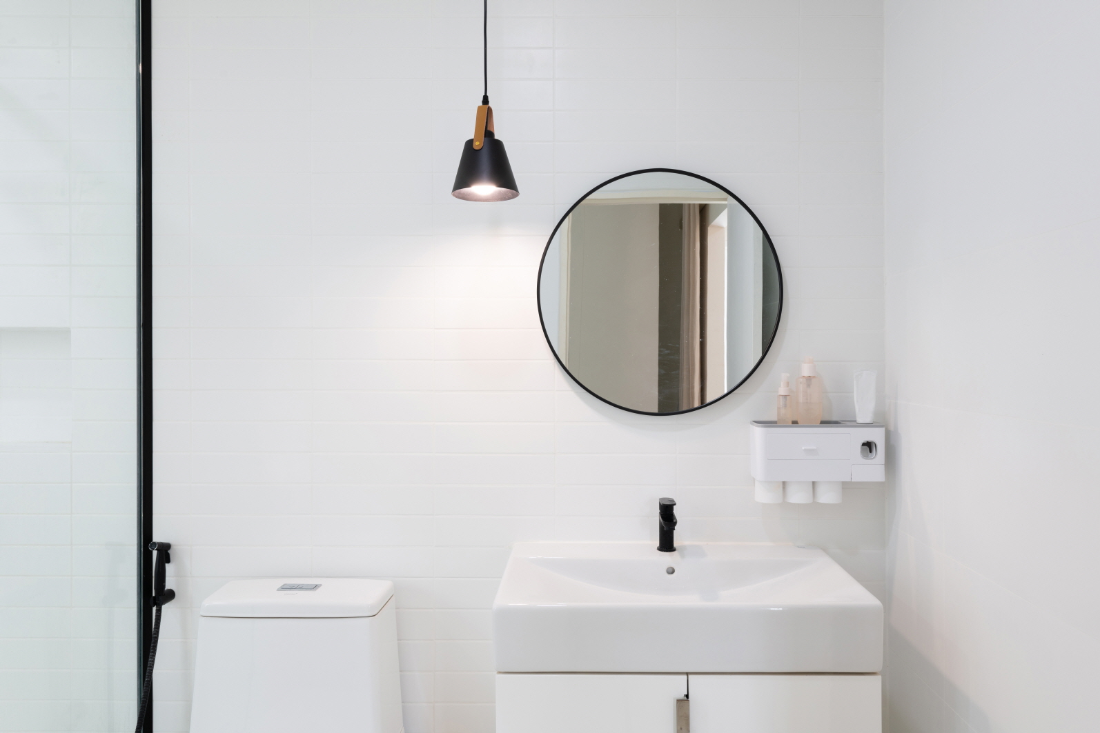 Decluttering your bathroom with a minimalist approach can make a small bathroom feel more spacious.