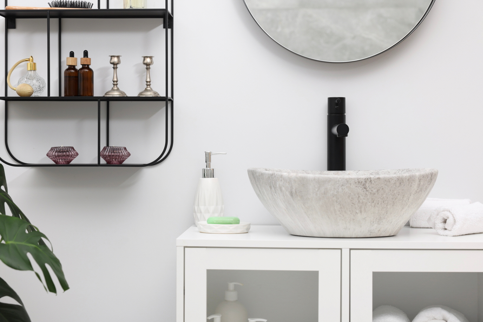 Floating shelves and built-in cabinets help maximize your bathroom space while adding a sleek, modern touch.