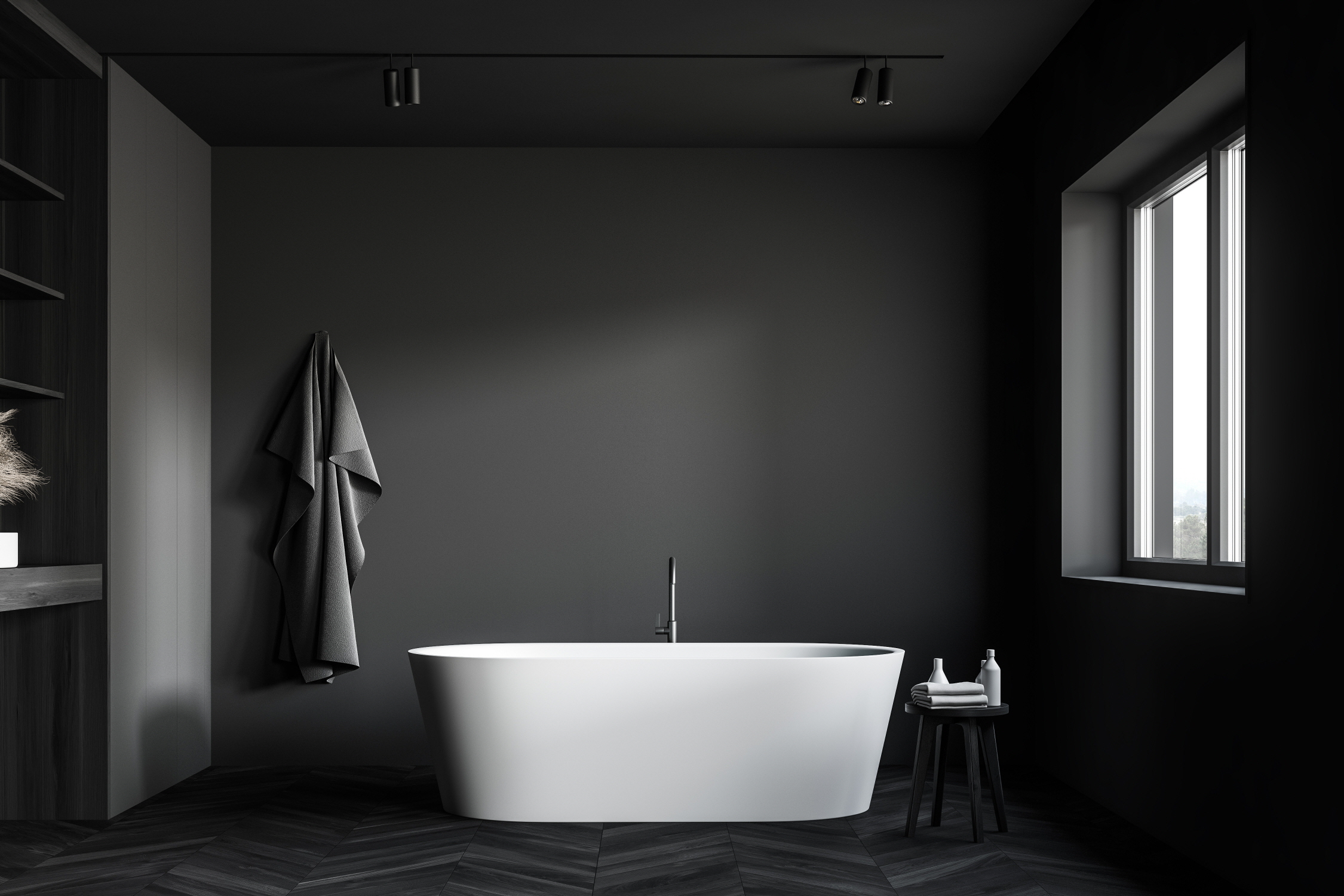 Visually expand the bathroom area and add sophistication with a black-and-white color palette.