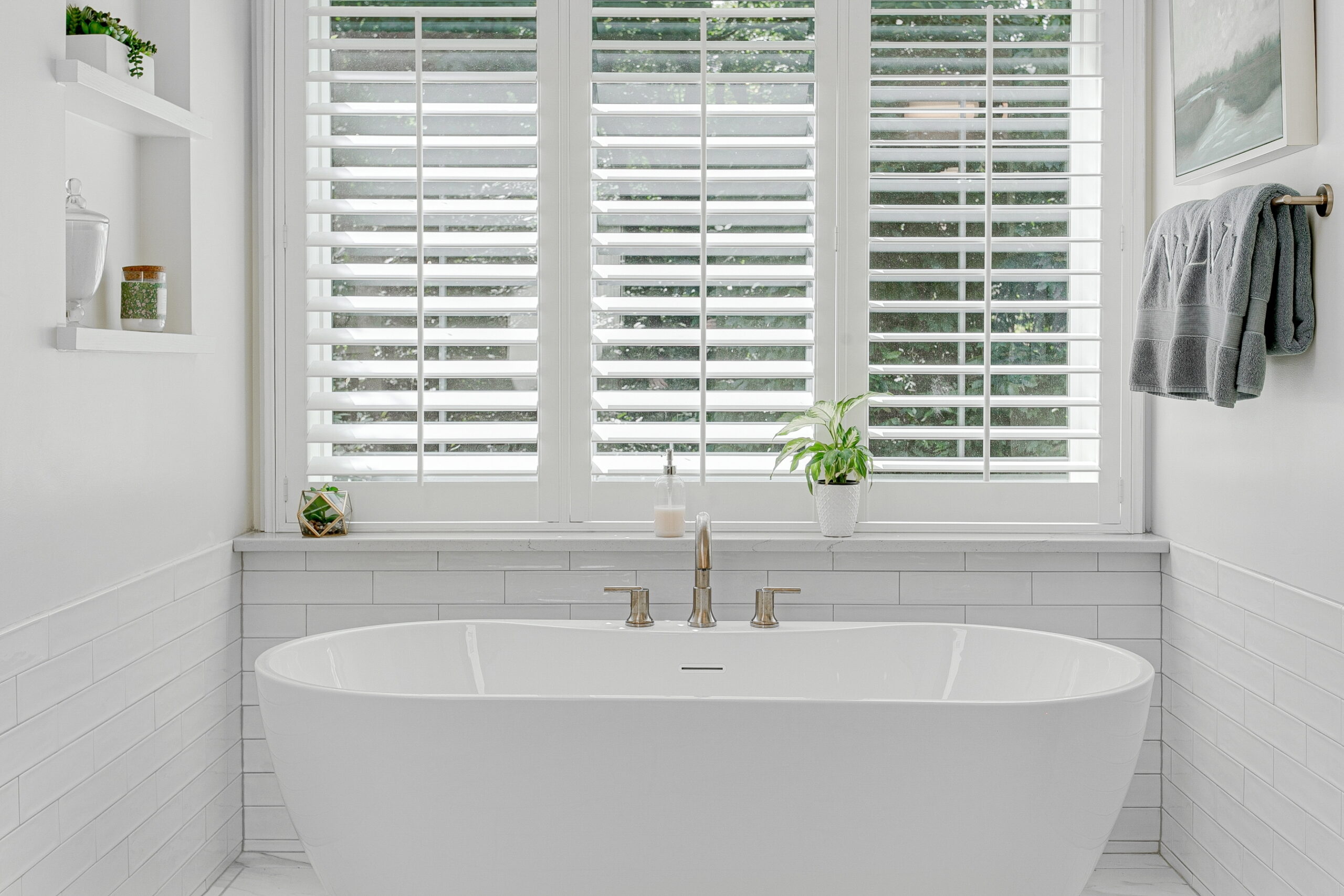 You can make your bathroom feel more spacious and inviting by letting in natural light through large windows.