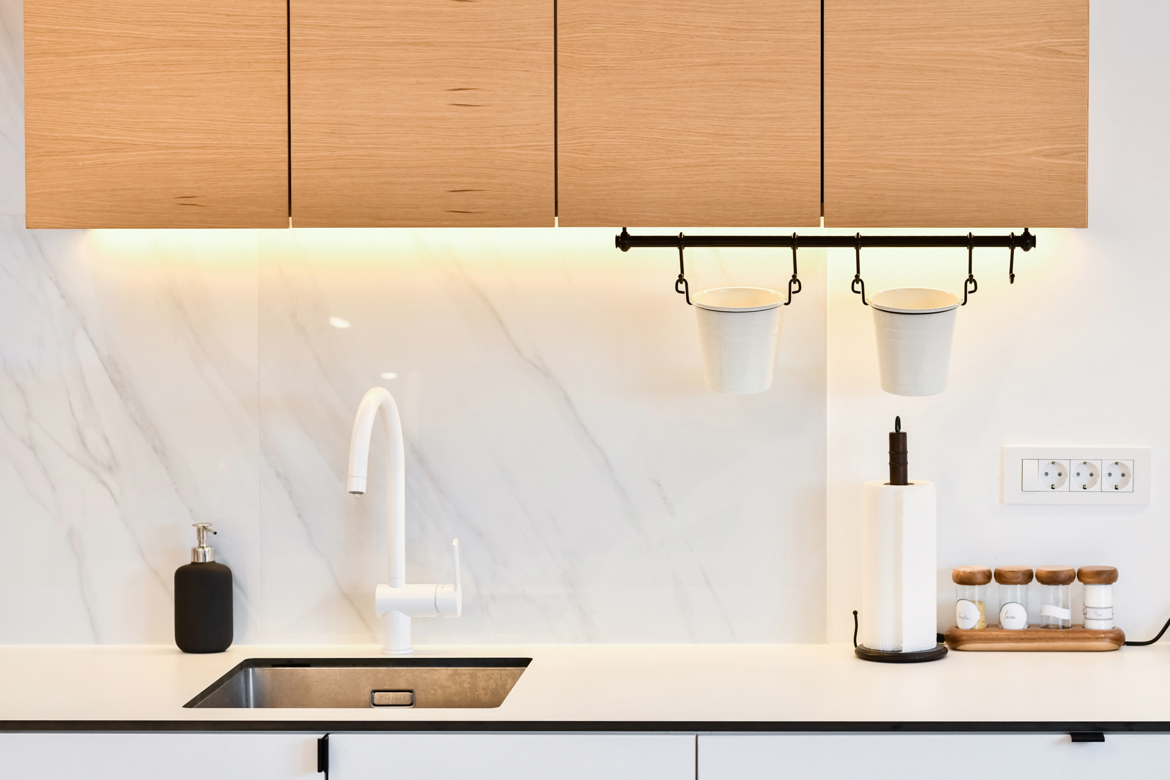 Consider installing lights under the cabinets to brighten up your space with unique lighting.