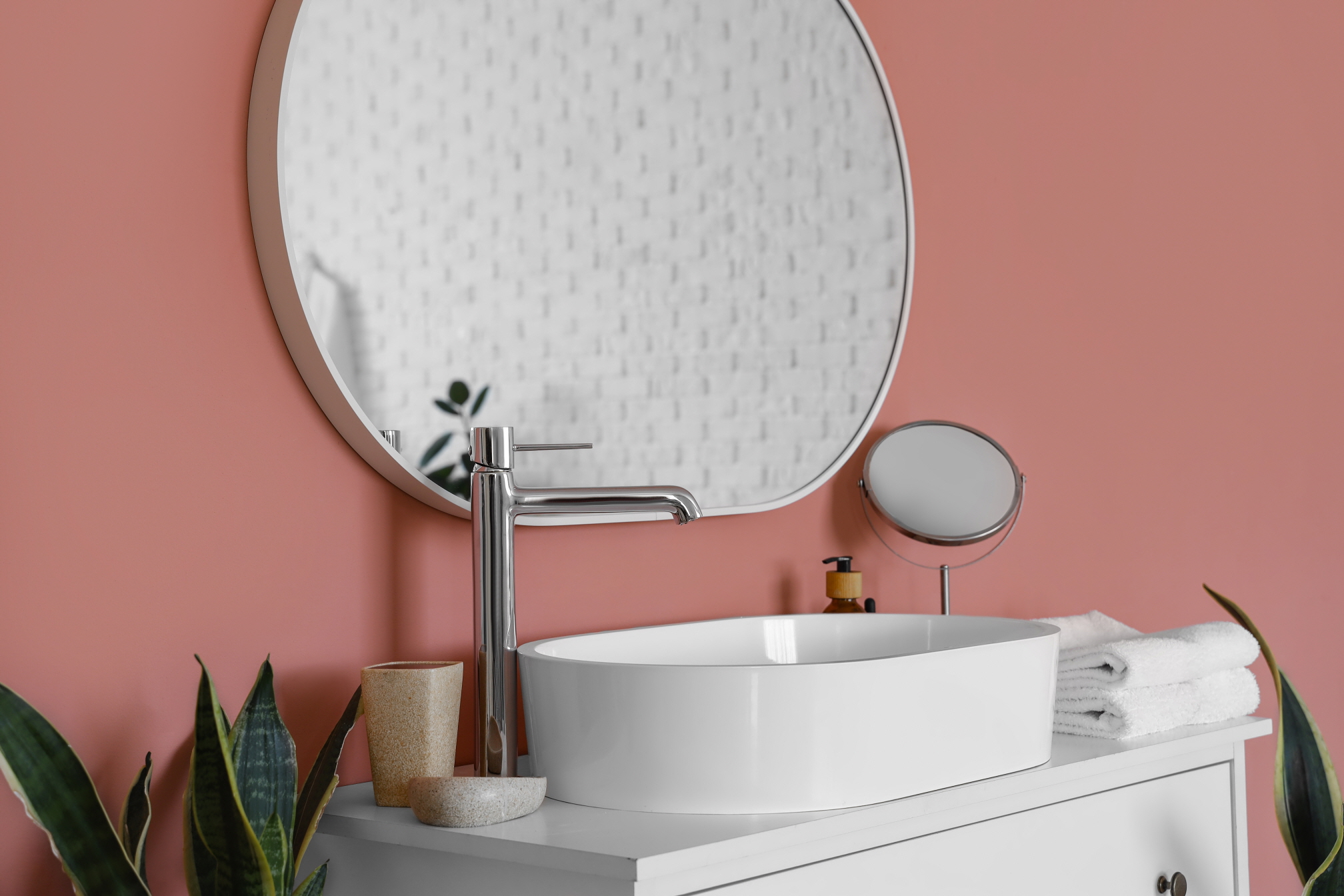 Pink is a fantastic choice for crafting a colorful bathroom that feels chic and warm.