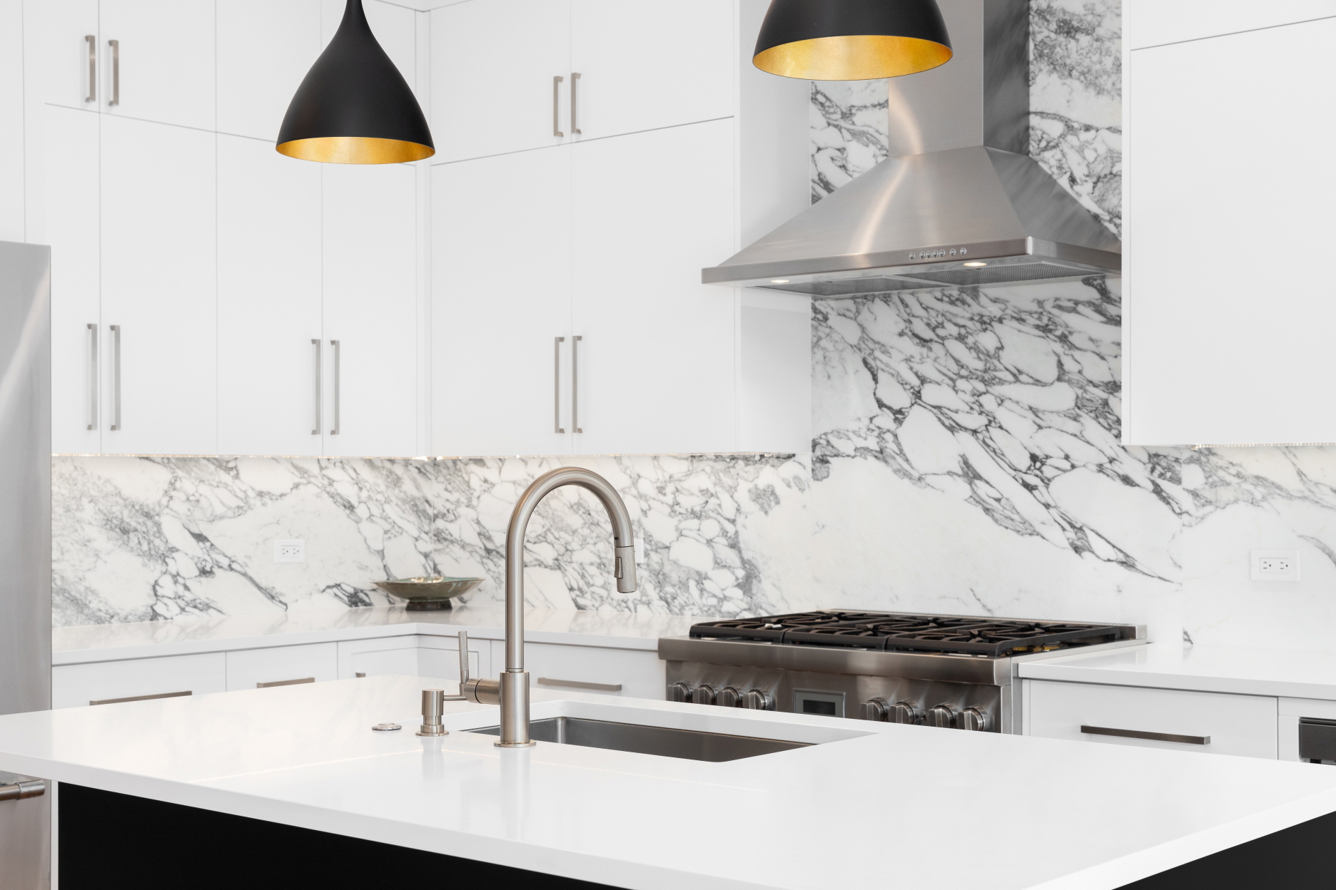 A well-designed backsplash can create the illusion of a larger kitchen space