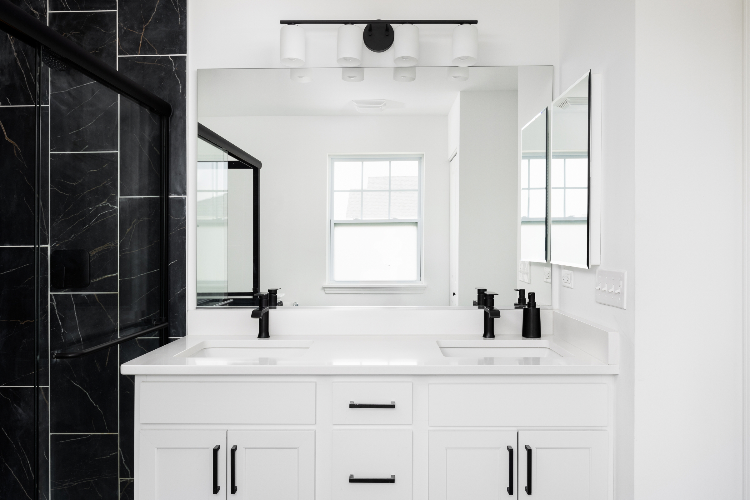 Consider a modern palette like white and black when selecting tile colors, as they are timeless choices.