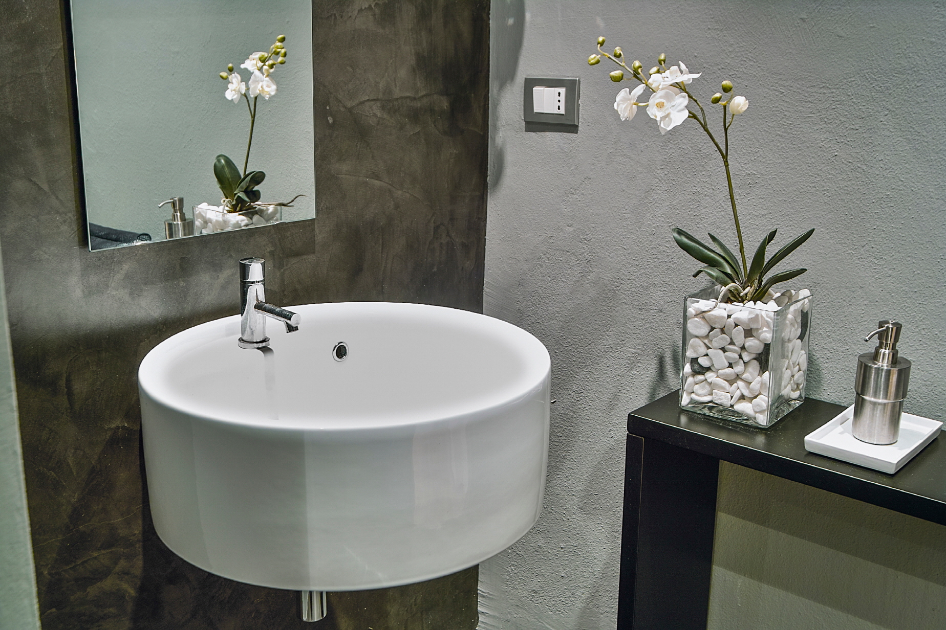  A wall-mounted sink frees up valuable floor space in your bathroom.