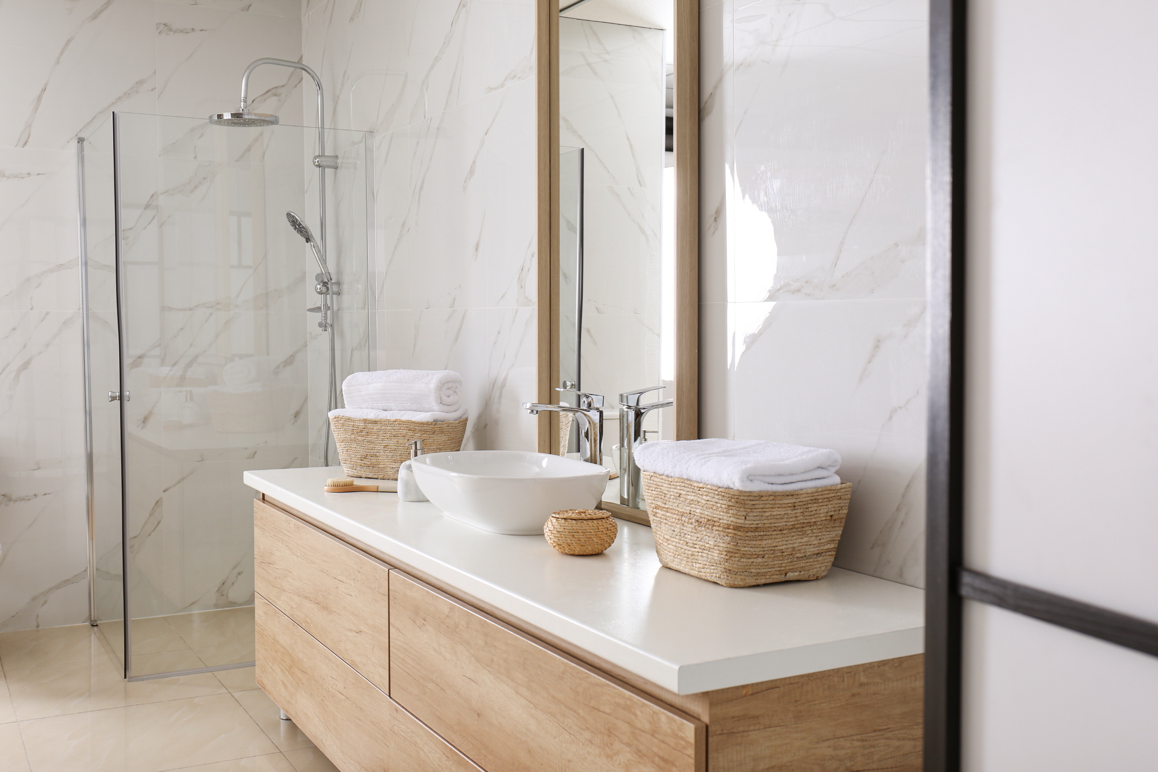 A minimalist design can make a bathroom feel larger while allowing for creativity in the space.