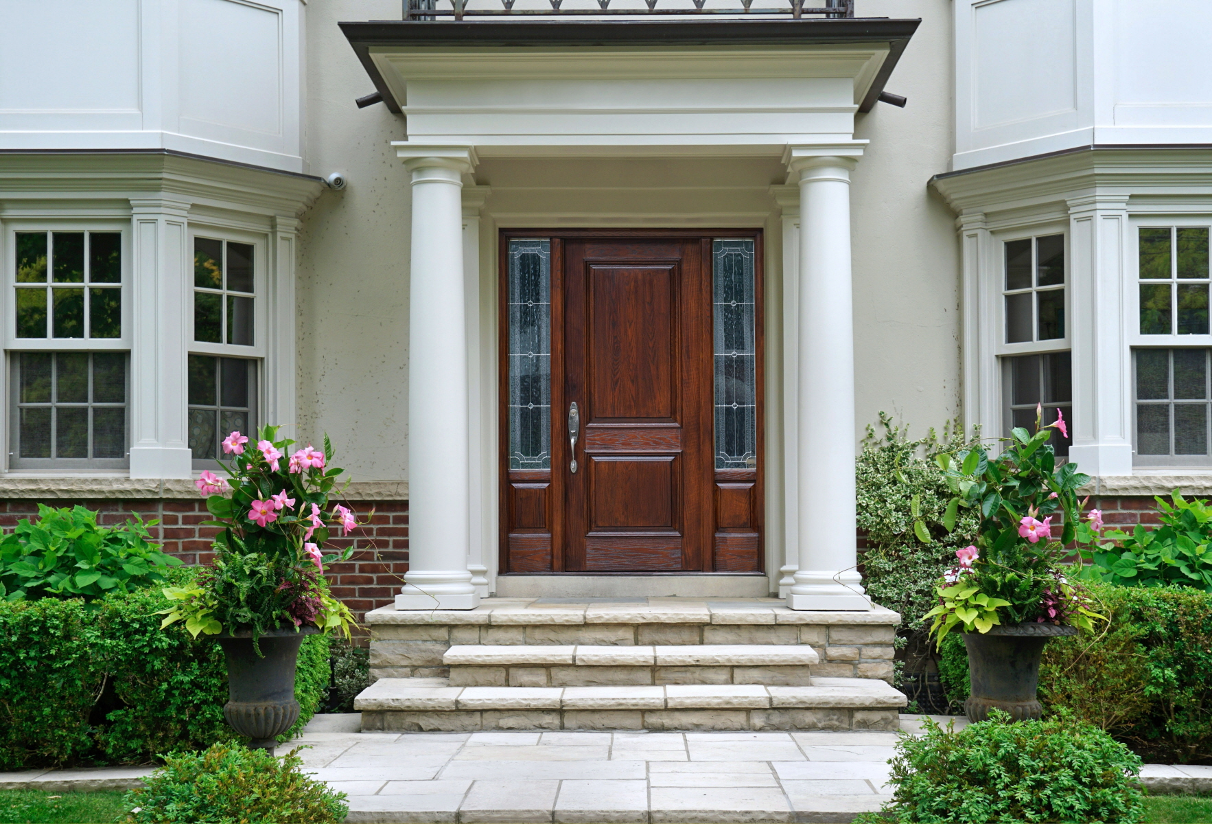 A portico not only protects your front door but also creates a grand entrance, offering timeless elegance.