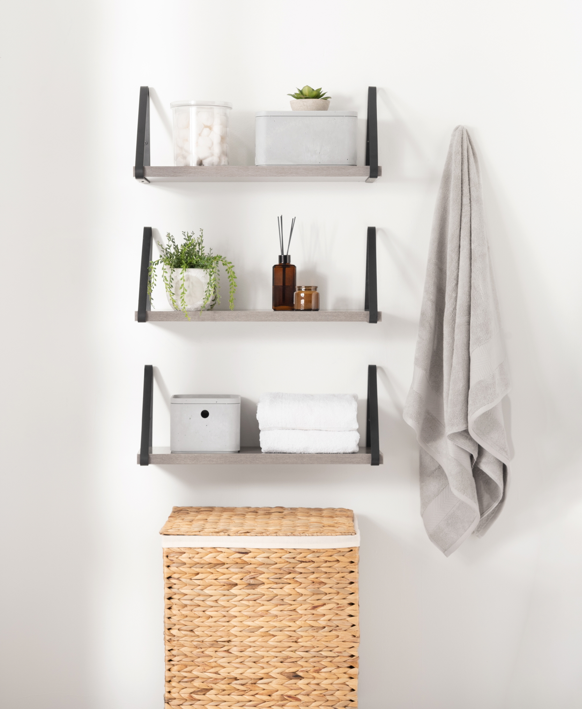 Organize bath products on open shelves to provide comfort for your guests.