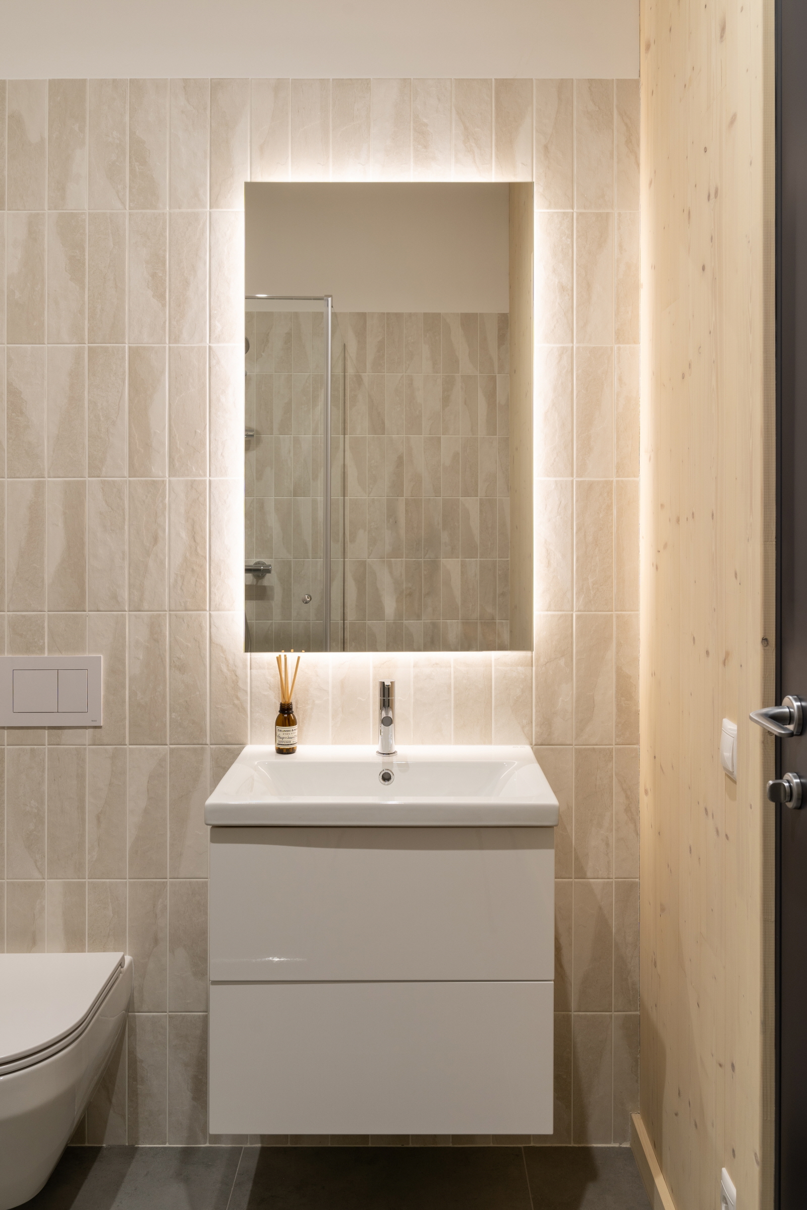 Use under-sink cabinets to maximize space and keep the bathroom tidy.