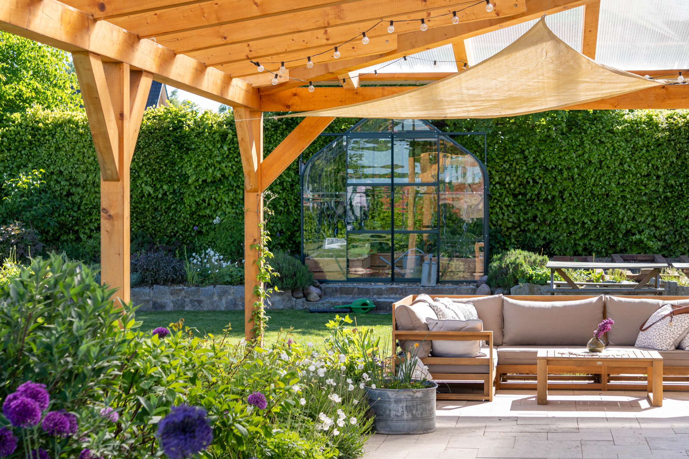 Adding garden features can transform your backyard patio into a natural escape, bringing a fresh vibe to the space.