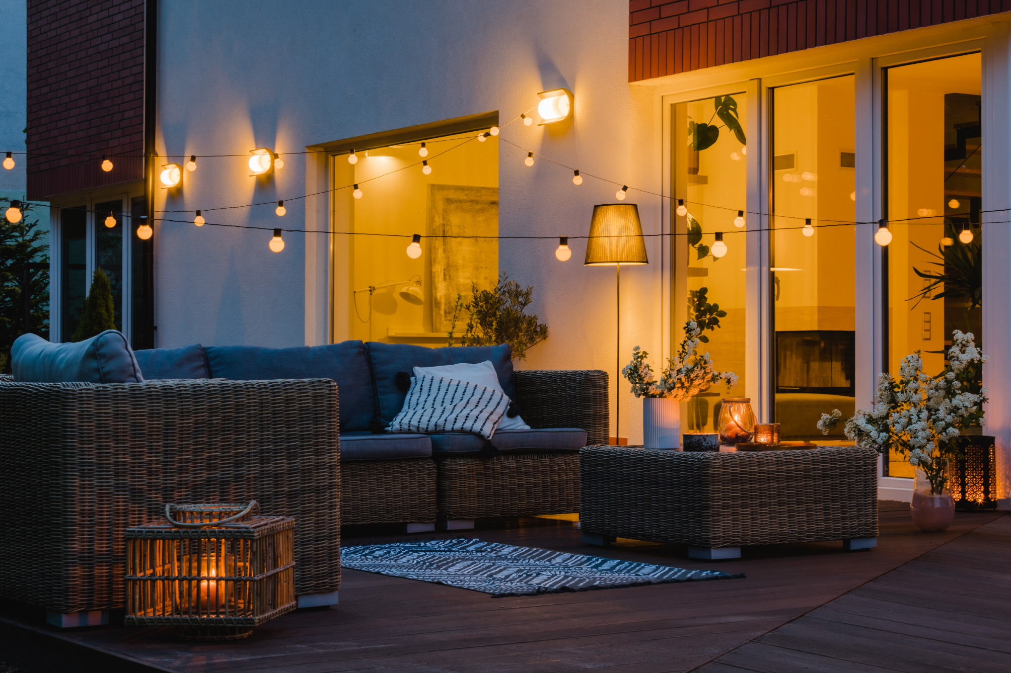 Overhead string lights bring charm and create a beautiful ambiance on your patio.