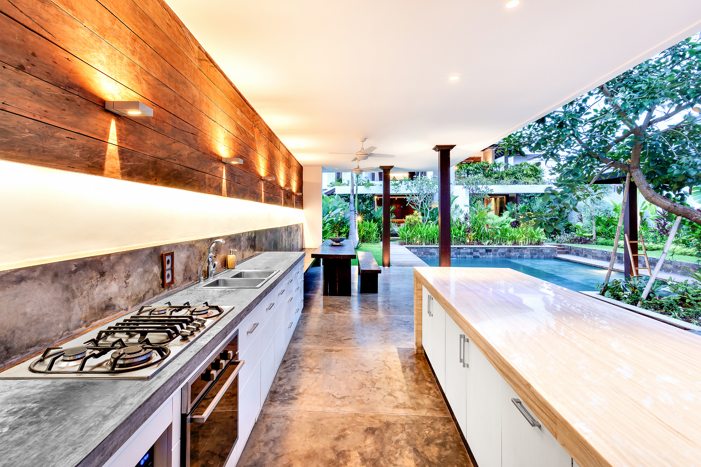 Ensure ample countertop space in your outdoor kitchen so guests can dine and relax comfortably.