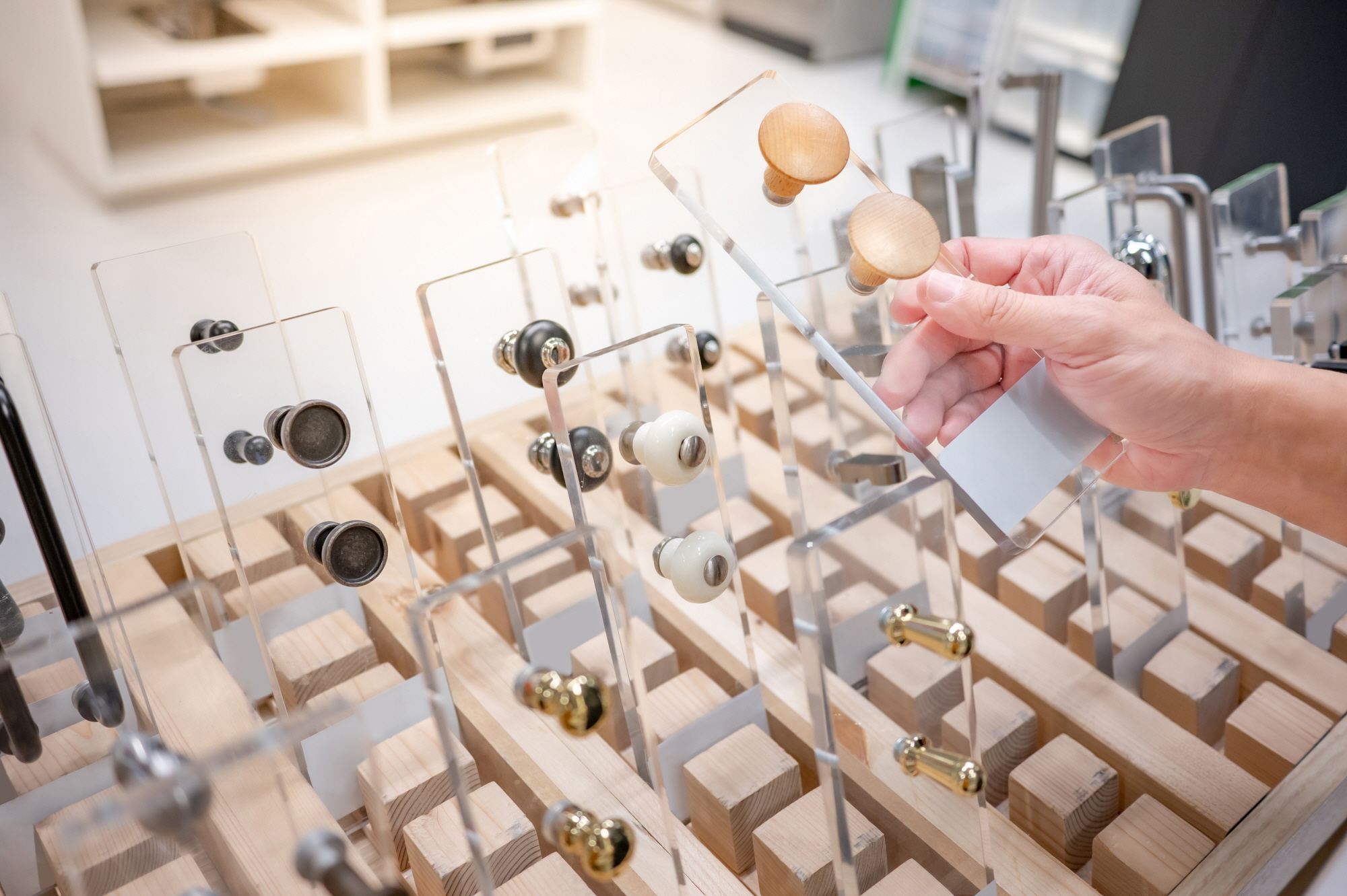 Replacing the hardware on cabinets and drawers is a DIY project that can help reduce labor costs.