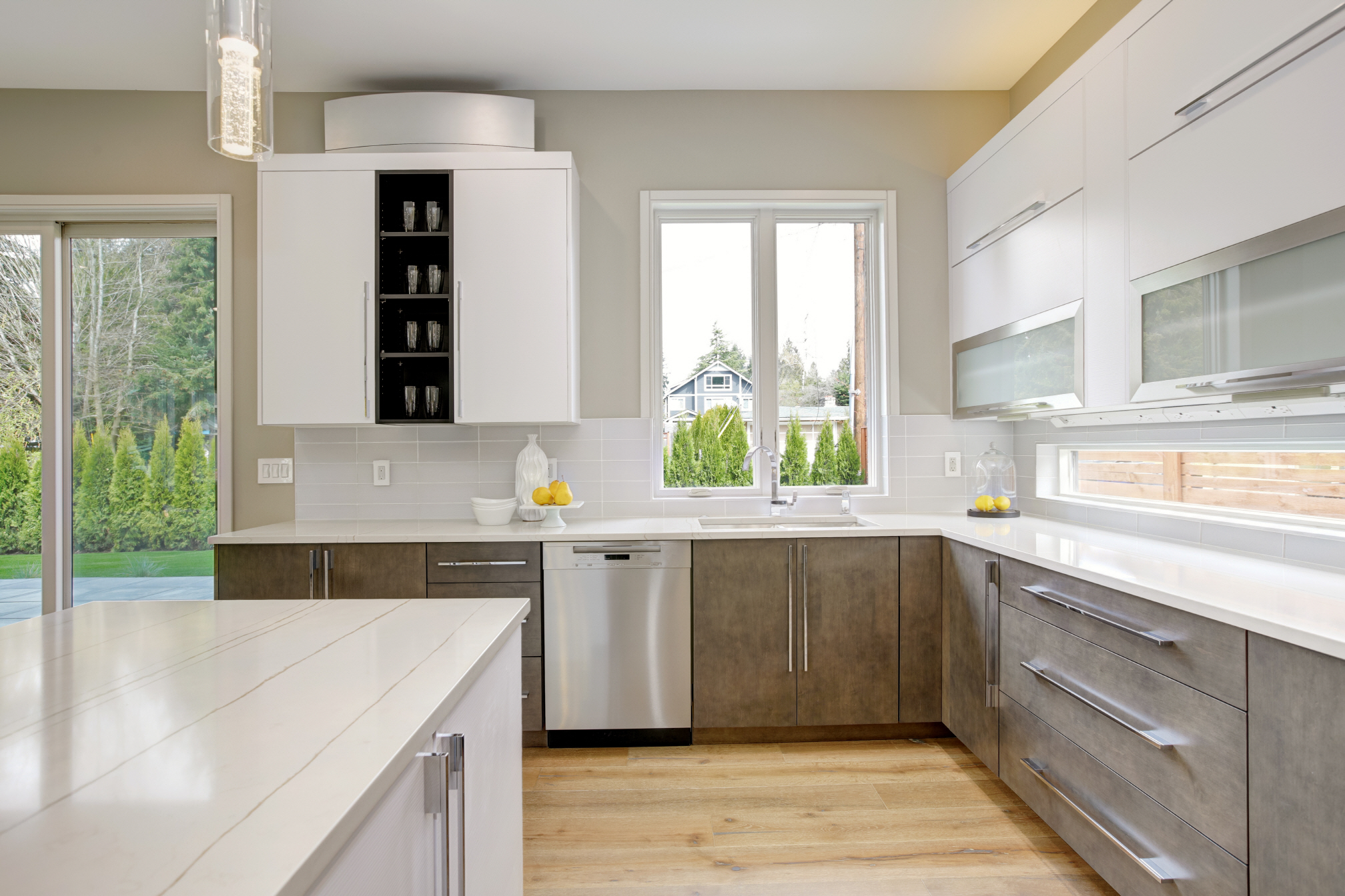 Increasing natural light in the kitchen is a key component for making the space feel more open and spacious.