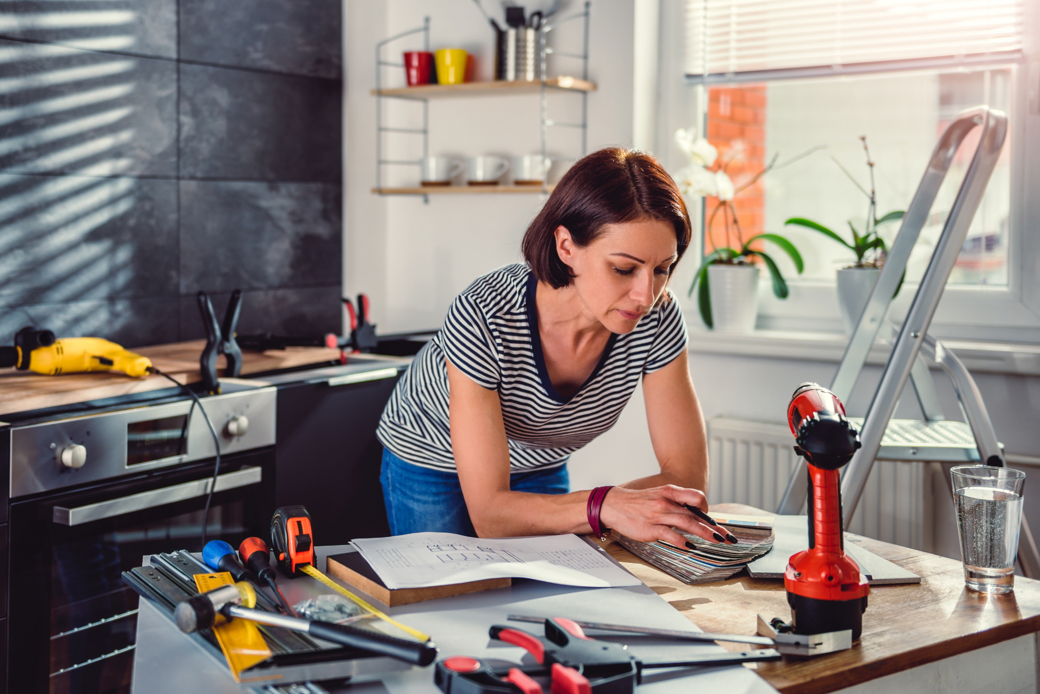 With the right tools and know-how, creating a new backsplash can be a fun DIY project!