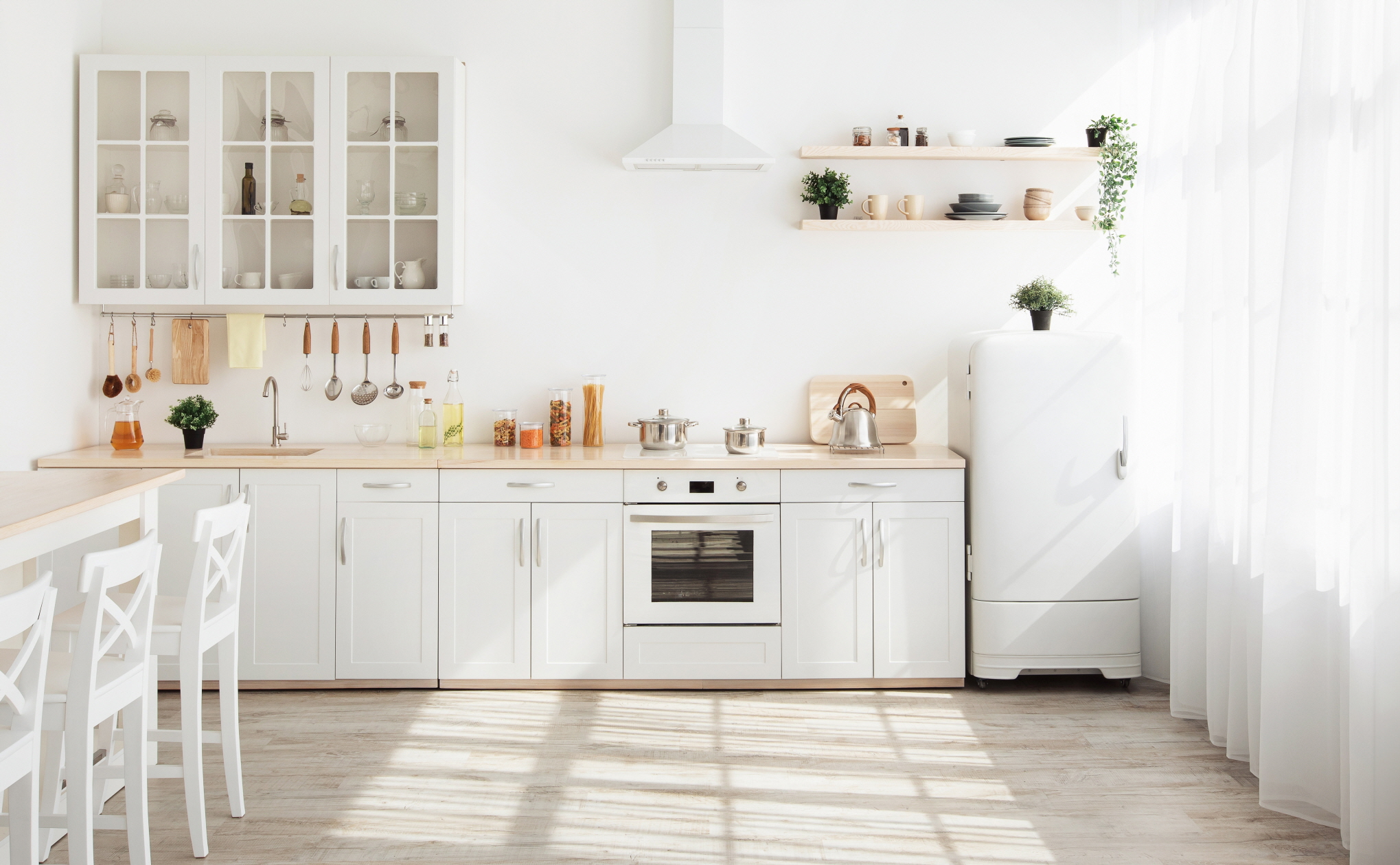 Refresh your kitchen with modern neutral colors like white for a clean and airy feel.