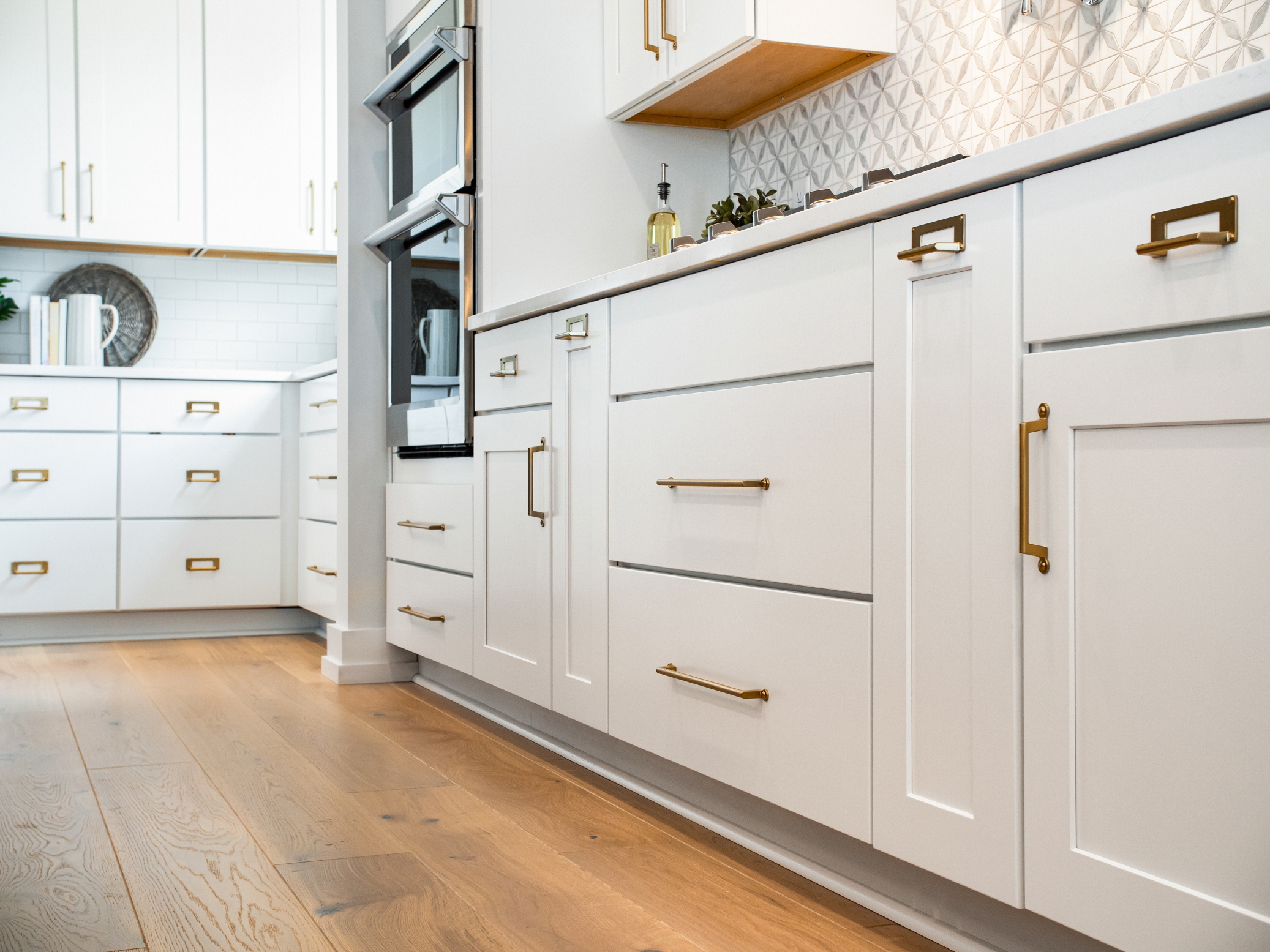 Cabinets should not only be visually appealing but also designed to accommodate all kitchen essentials functionally.